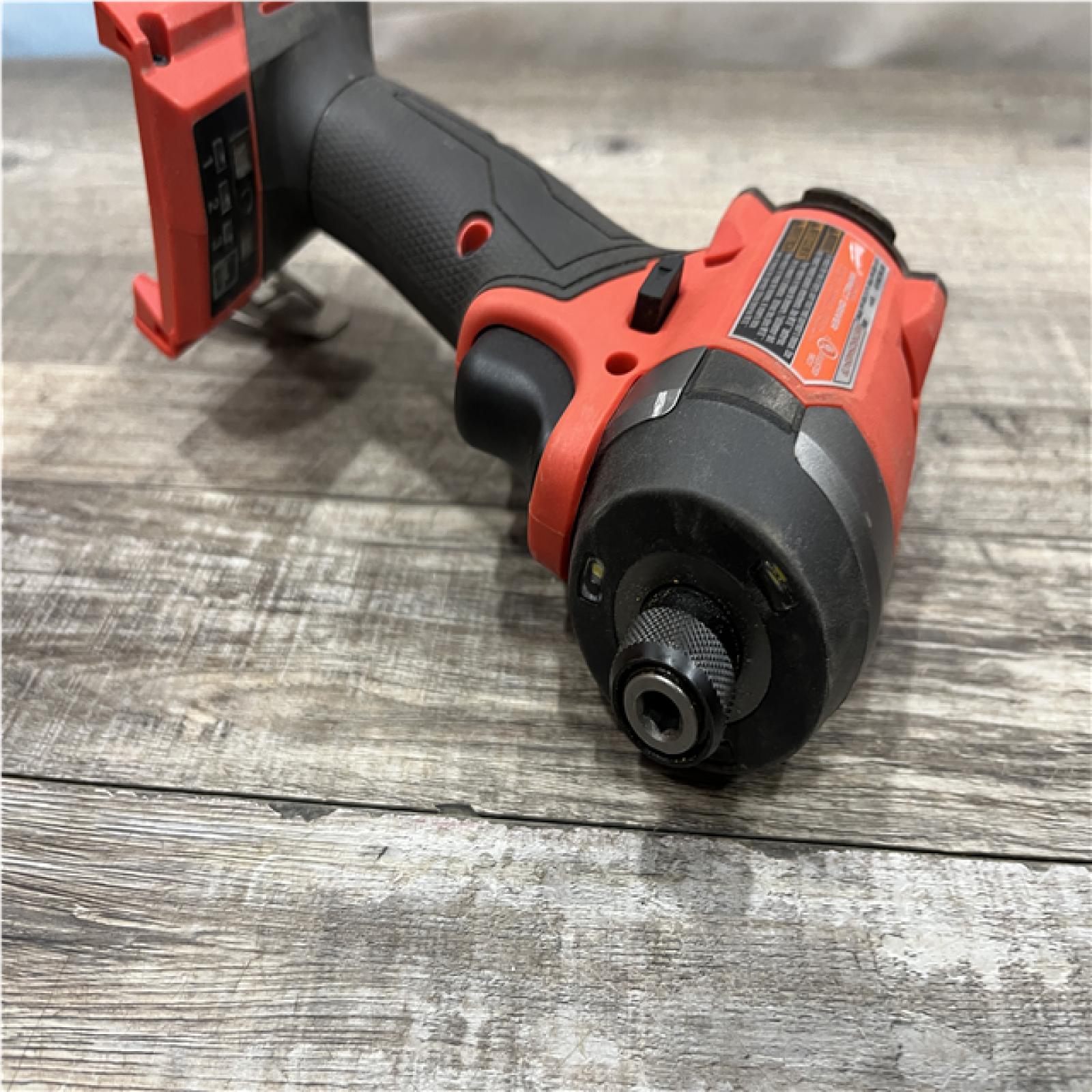 AS-IS Milwaukee FUEL 18V Lithium-Ion Brushless Cordless 1/4 in. Hex Impact Driver Kit