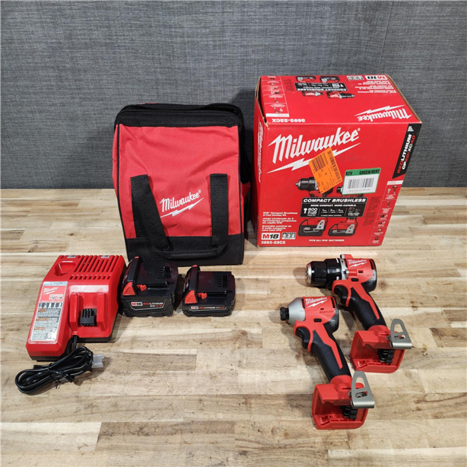 HOUSTON LOCATION - AS-IS (APPEARS LIKE NEW) M18 18-Volt Lithium-Ion Brushless Cordless Compact Hammer Drill/Impact Combo Kit (2-Tool) with (2) Batteries  Bag