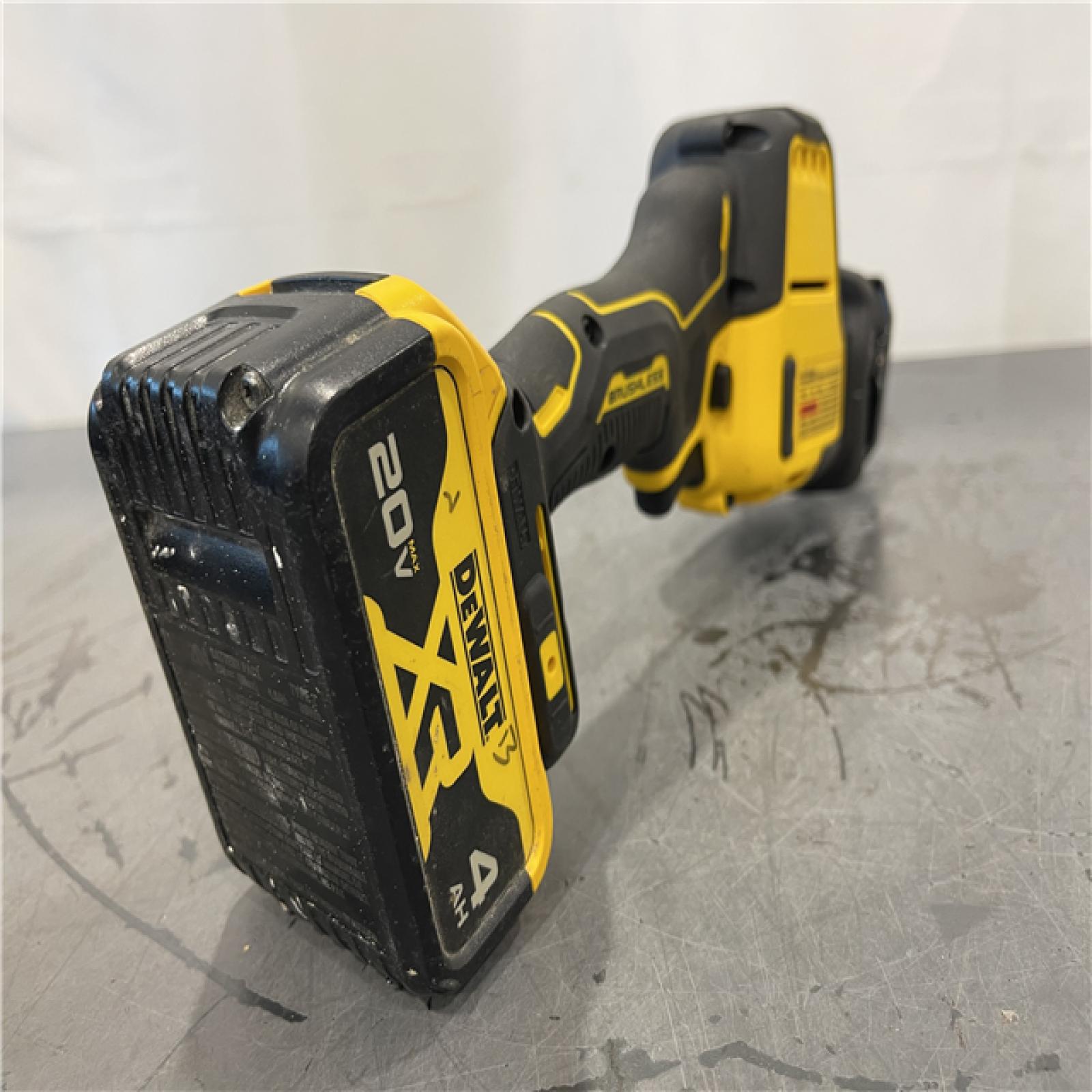 AS-IS - DeWalt ATOMIC 20V MAX Cordless Brushless Compact Reciprocating Saw and (1) 20V XR Lithium-Ion 4.0Ah Battery