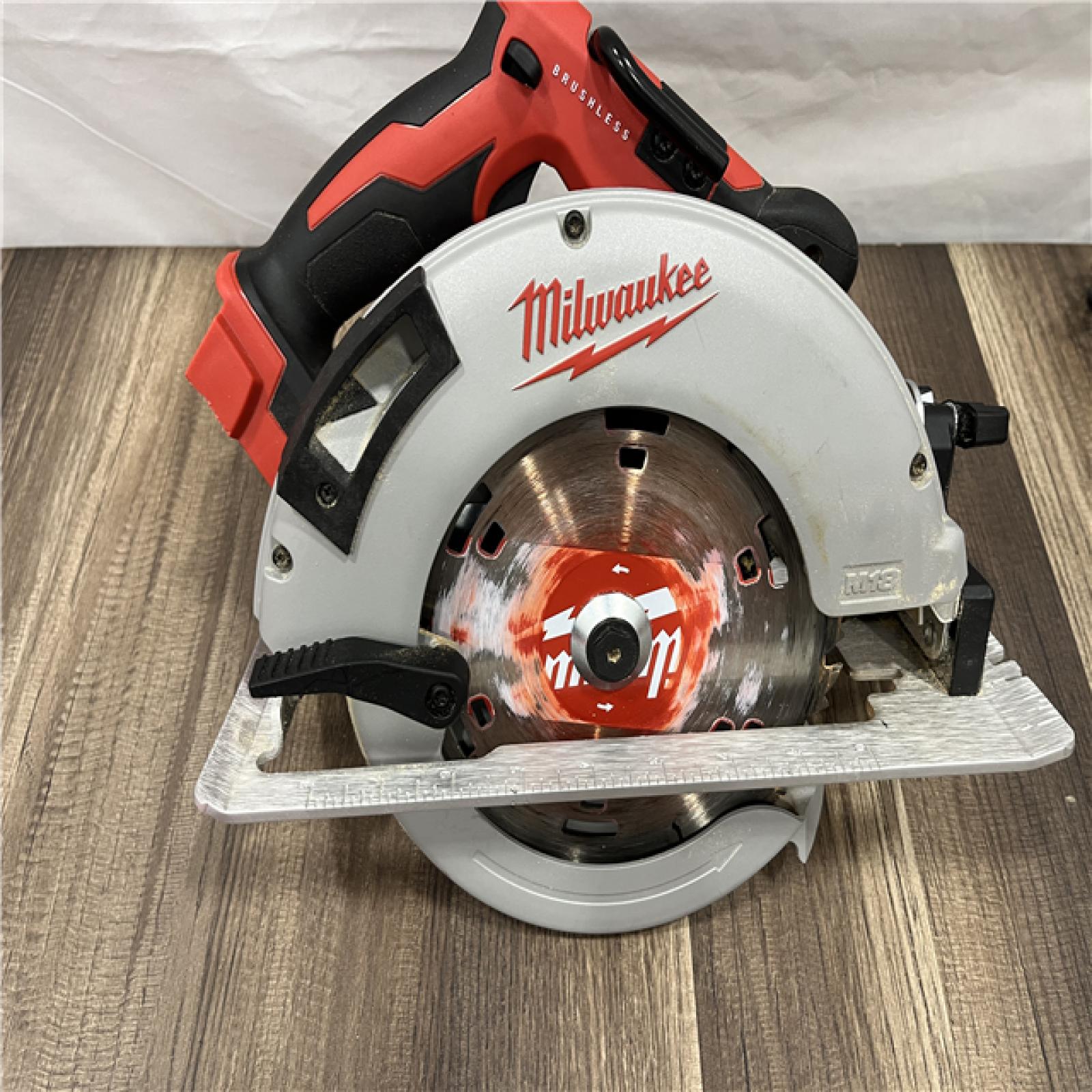 AS-IS Milwaukee M18 18-Volt Lithium-Ion Brushless Cordless Combo Kit (4-Tool) with 2-Batteries, 1-Charger and Tool Bag