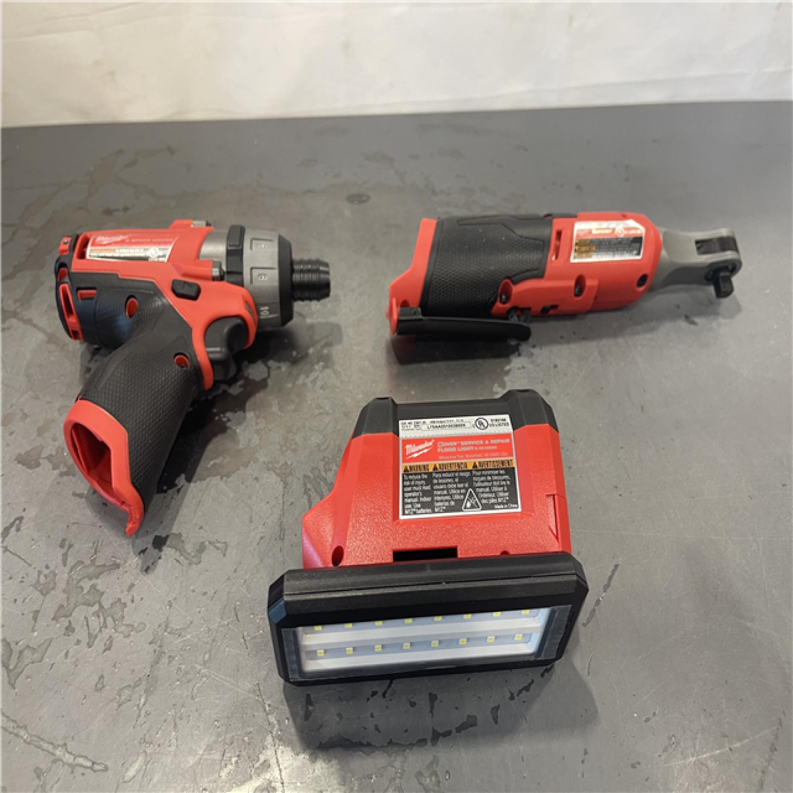 AS-IS- M12 12V Lithium-Ion Cordless Screwdriver, 3/8 in. High Speed Ratchet, Light Combo Kit (3-Tool) W/ 2 Batteries & Charger