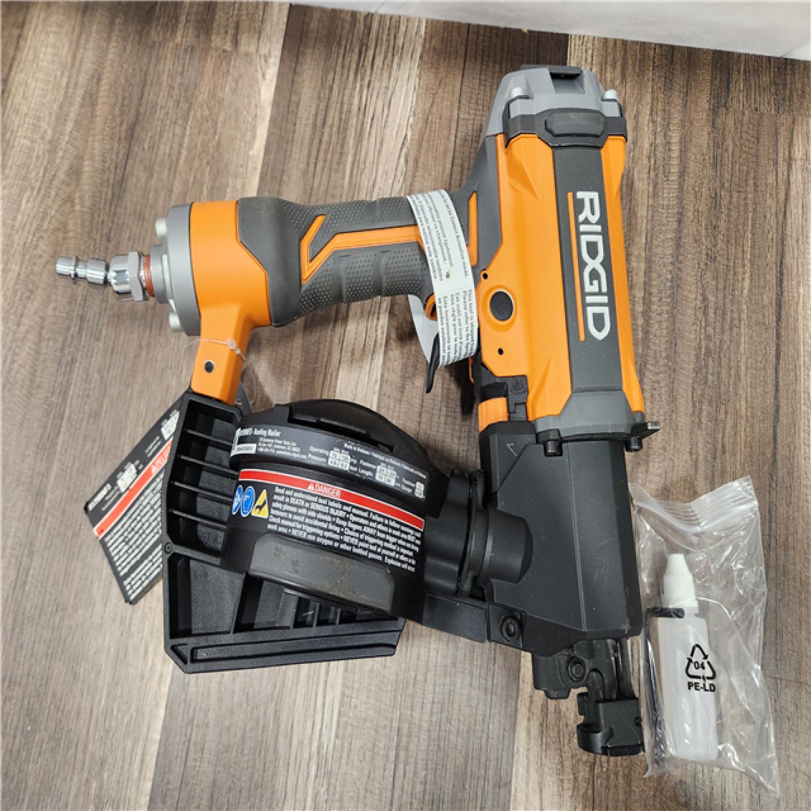 AS-IS - RIDGID Pneumatic 15 Deg. 1-3/4 in. Coil Roofing Nailer