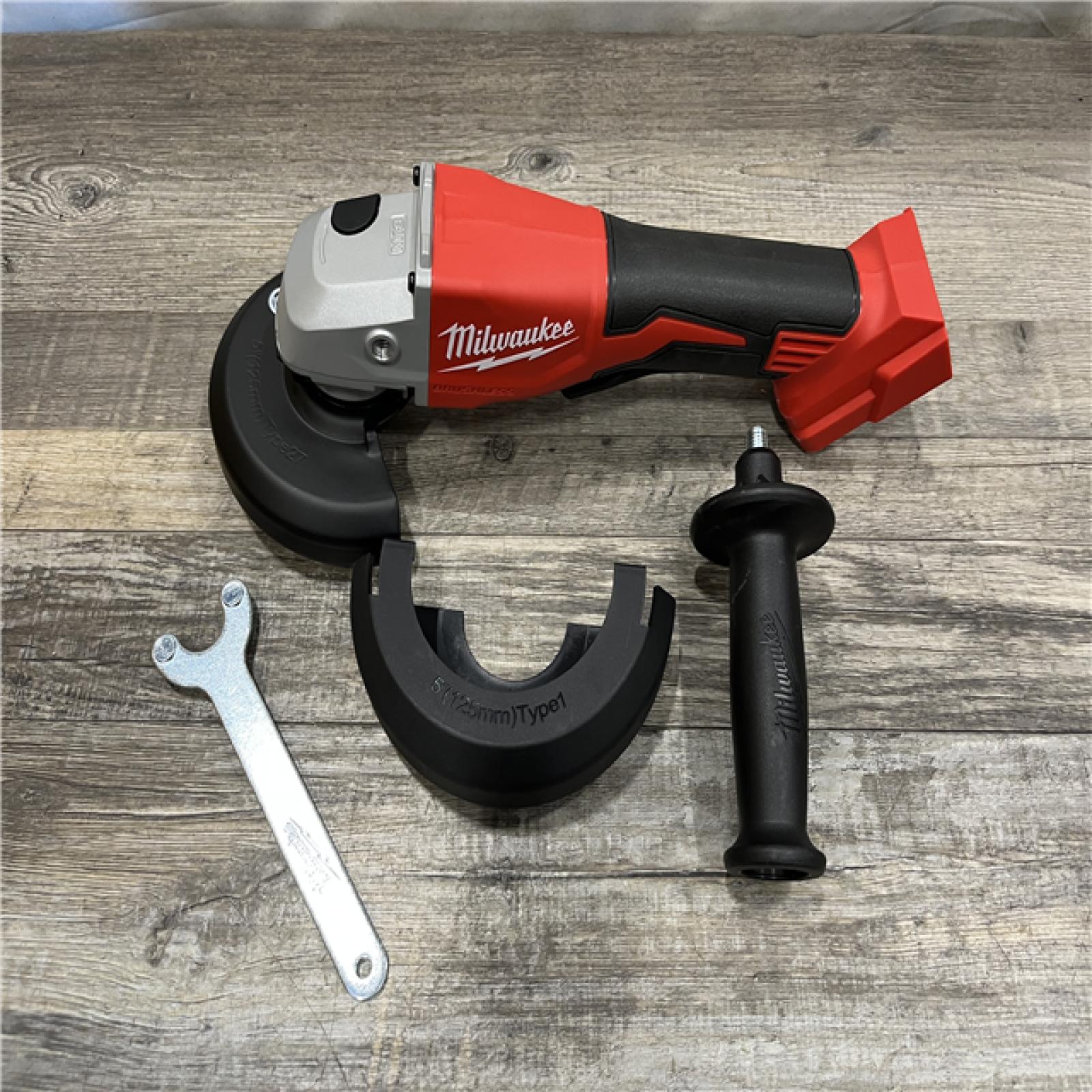 AS-IS Milwaukee 18V Lithium-Ion Brushless Cordless 4-1/2 in./5 in. Grinder w/Paddle Switch (Tool-Only)