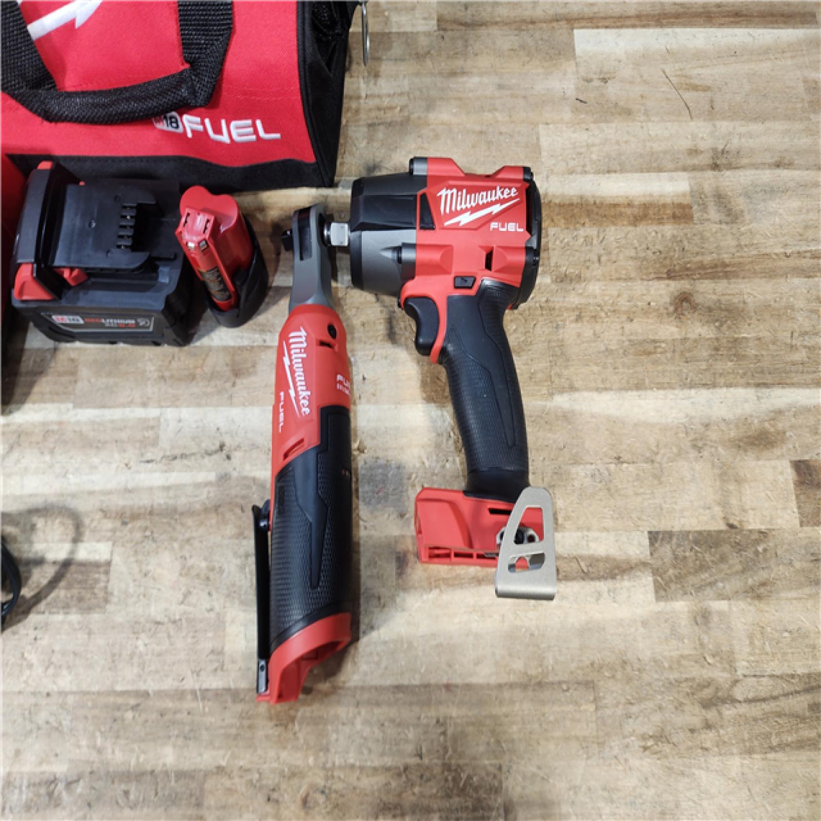 HOUSTON LOCATION - AS - IS Milwaukee FUEL 18V Cordless Mid Torque 1/2 in. Impact Wrench w/ 12 FUEL 3/8 in. Ratchet Combo Kit