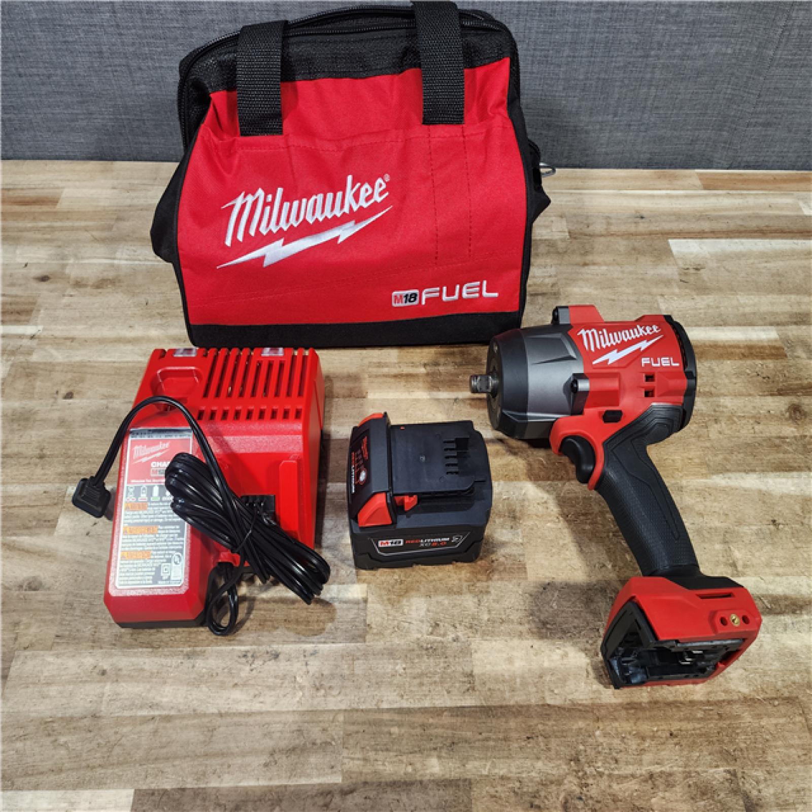 HOUSTON LOCATION - AS - IS Milwaukee FUEL 18V Lithium-Ion Brushless Cordless 1/2 in. Impact Wrench w/ BAG KIT