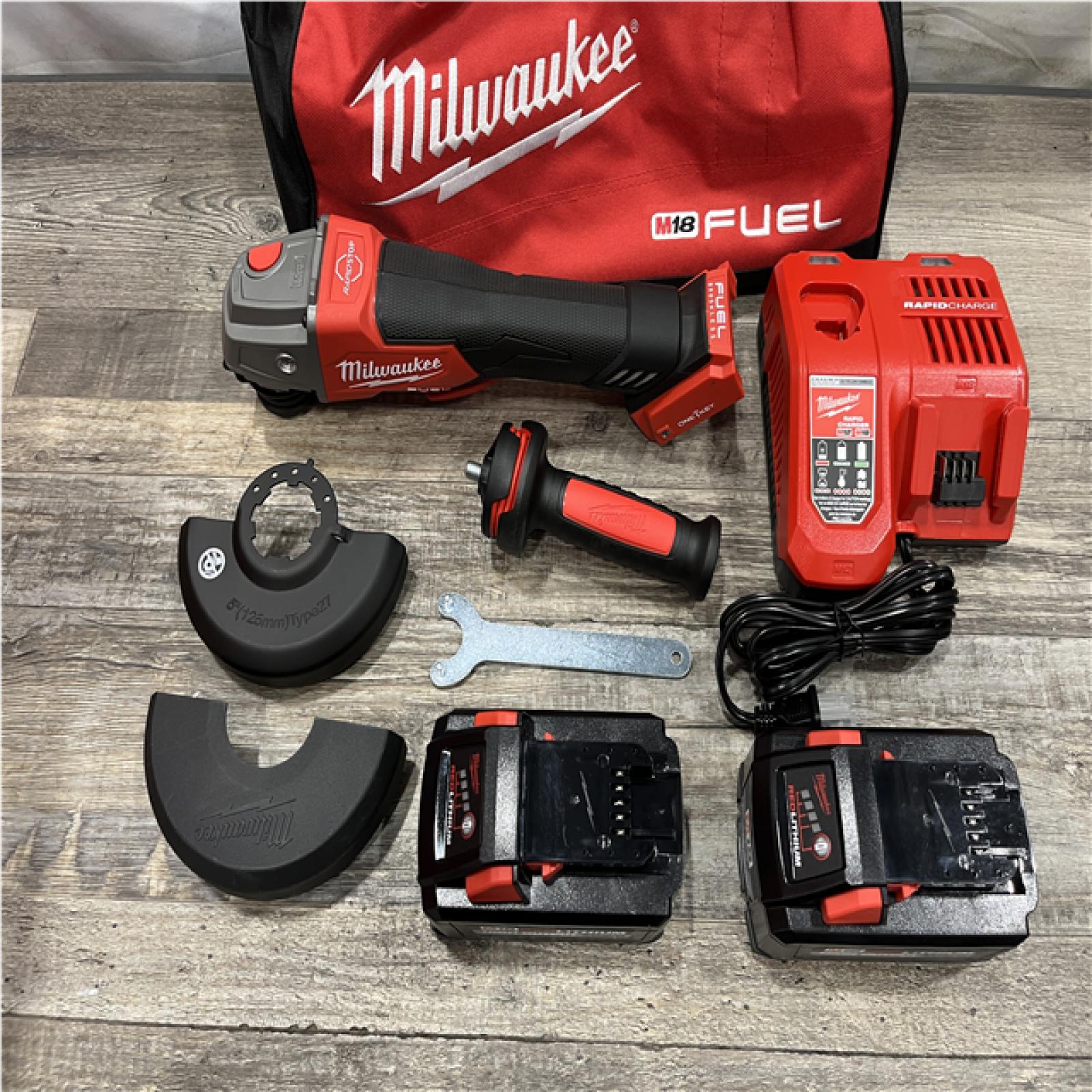 AS-IS Milwaukee FUEL 18V Lithium-Ion Brushless Cordless 4-1/2 in./5 in. Braking Grinder Kit