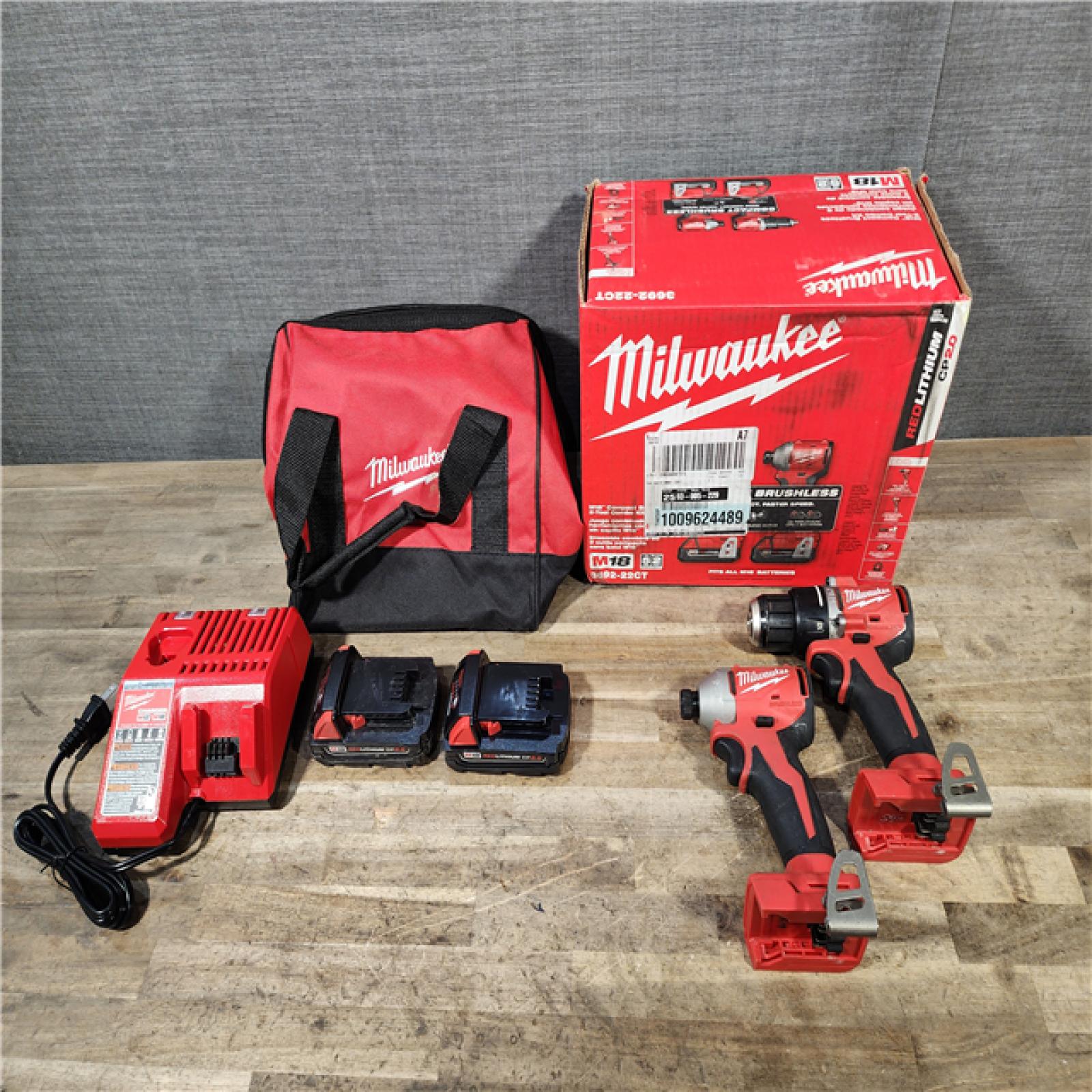 HOUSTON LOCATION - AS-IS Milwaukee M18 18V Lithium-Ion Brushless Cordless Compact Drill/Impact Combo Kit (2-Tool) W/(2) 2.0 Ah Batteries  Charger & Bag