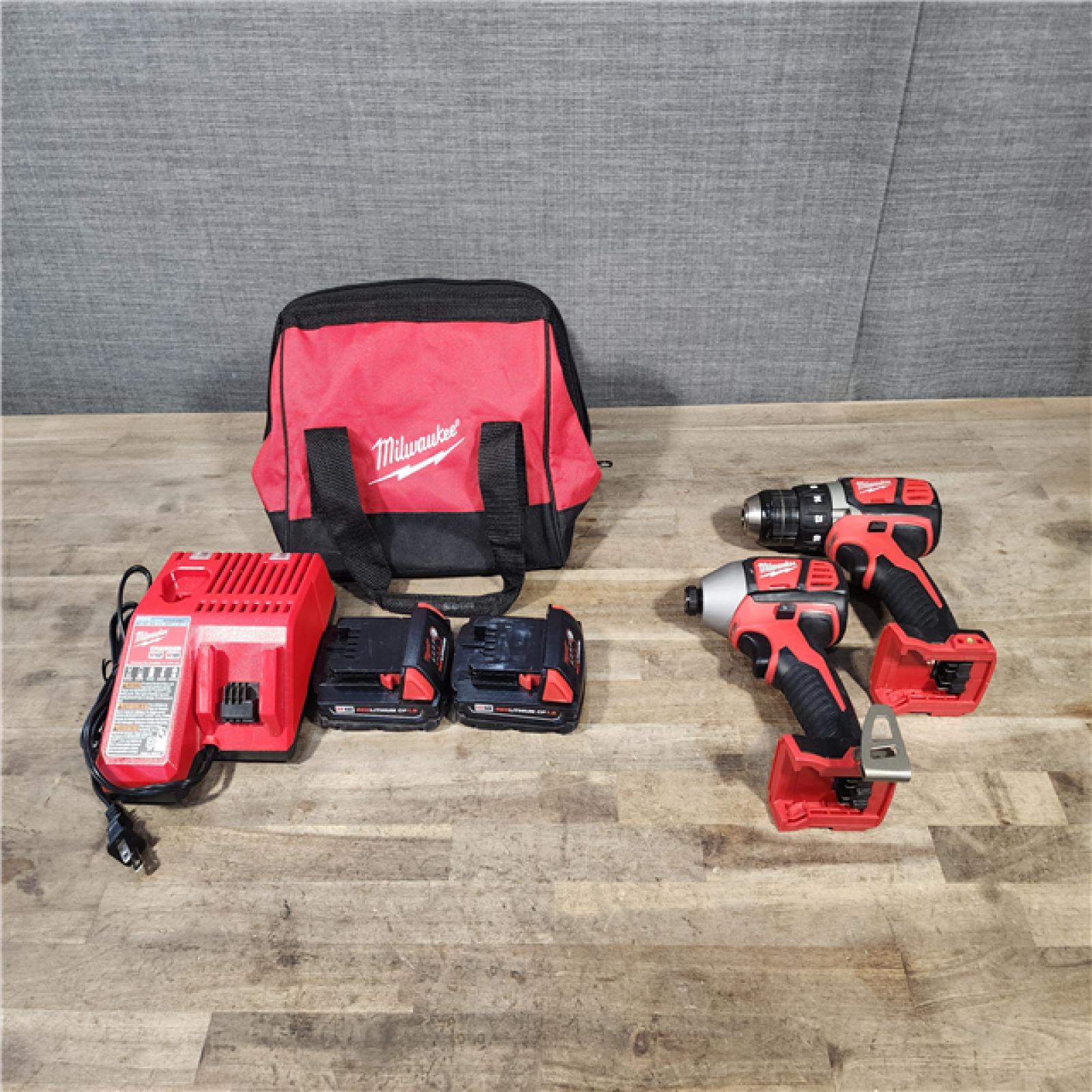 HOUSTON LOCATION - AS-IS Milwaukee 18V Cordless Brushed 2-Tool Drill/Driver and Impact Driver Kit
