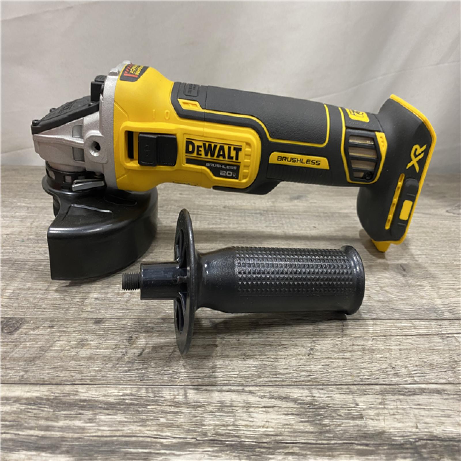 AS-IS DEWALT 20V MAX XR Cordless Brushless 4.5 in. Slide Switch Small Angle Grinder with Kickback Brake (Tool Only)