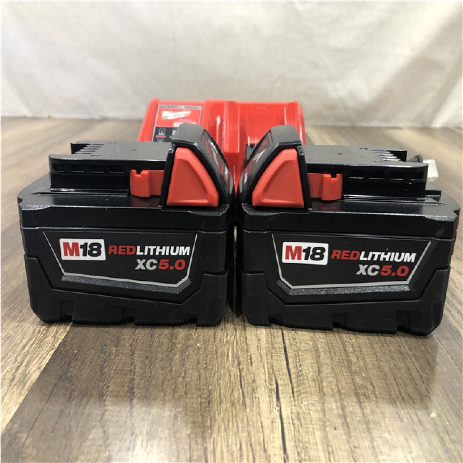 AS-IS Milwaukee 18-Volt Lithium-Ion XC Starter Kit with (2) 5.0Ah Batteries and Charger