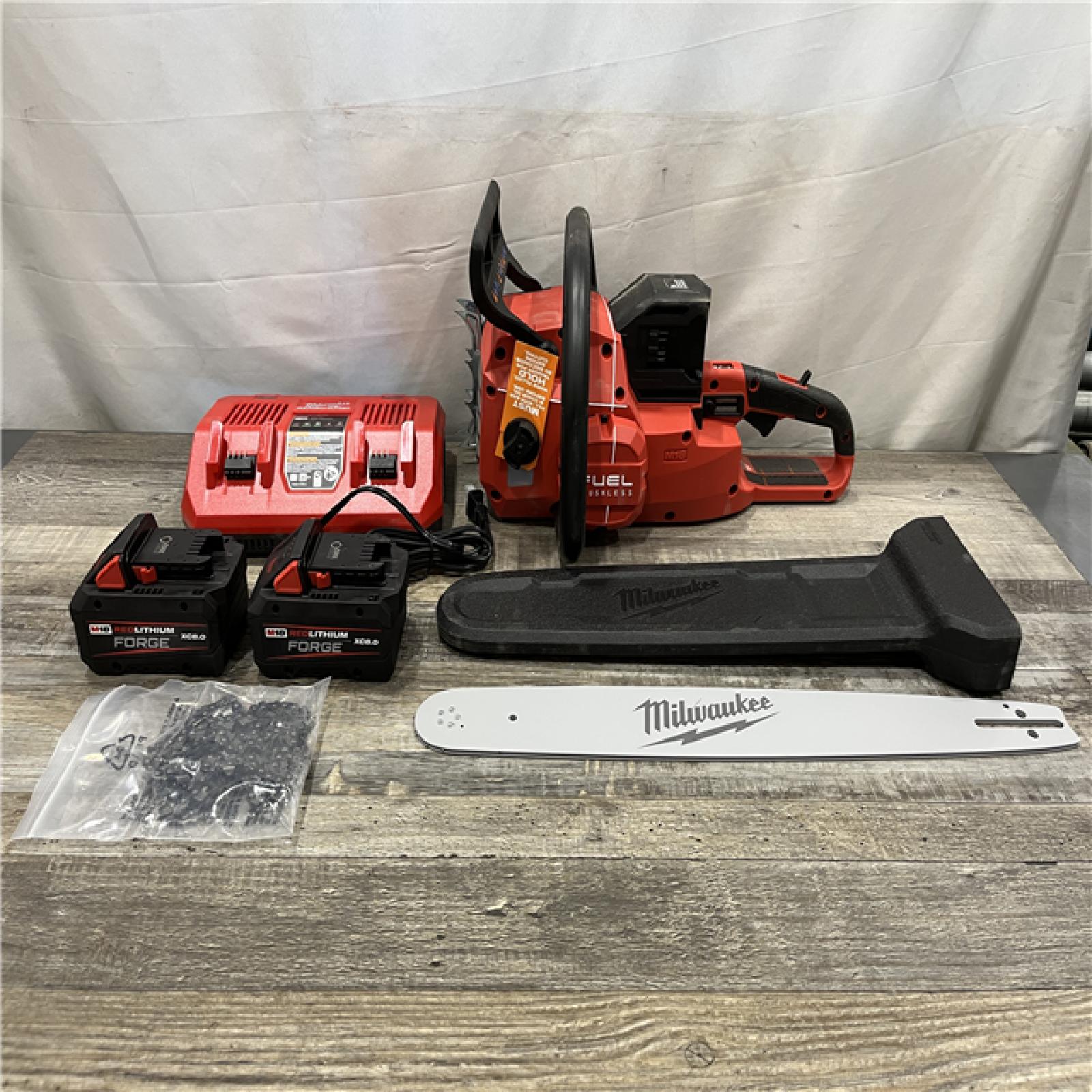 AS-IS Milwaukee FUEL 18V Brushless Cordless 20 in. Dual Battery Chainsaw Kit