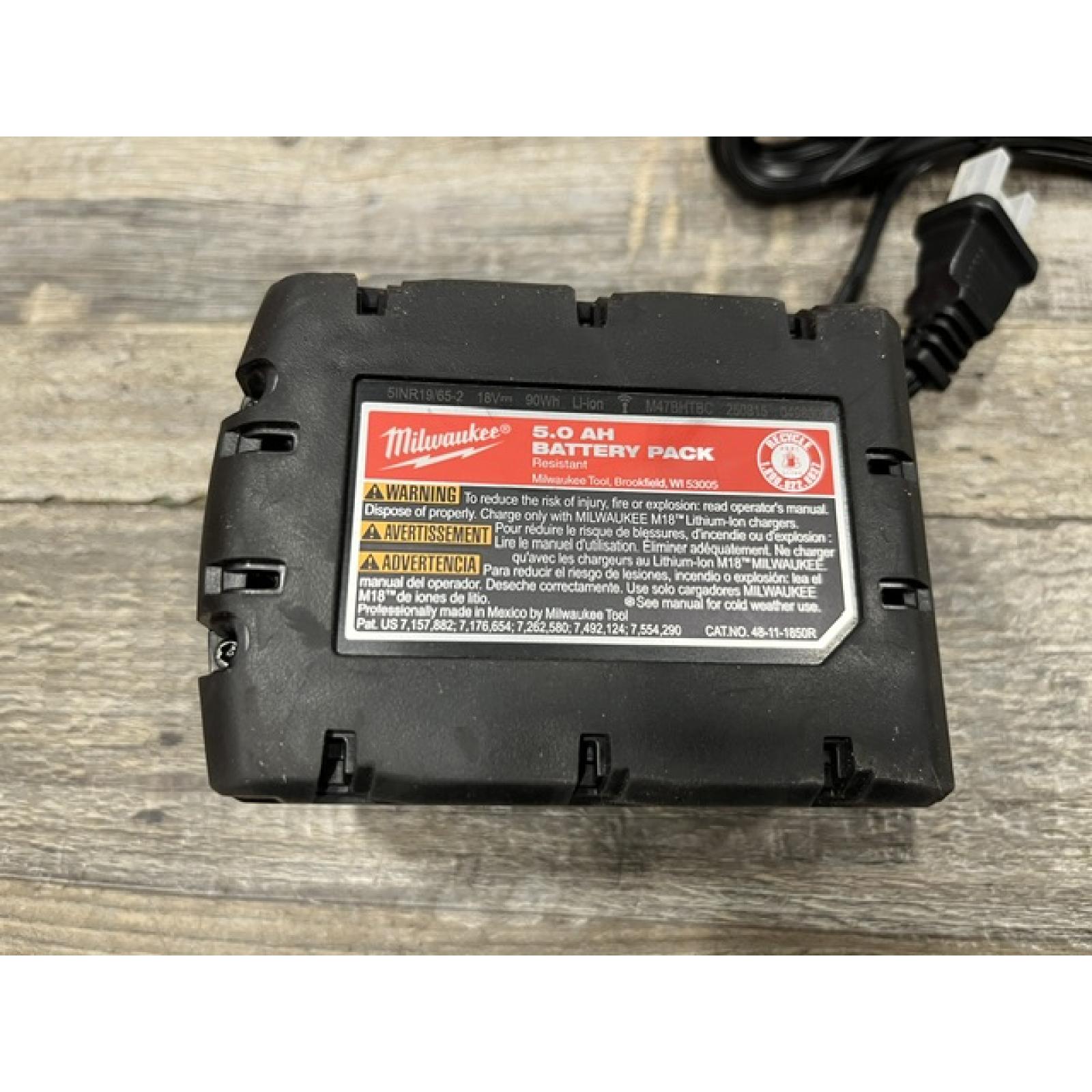 AS-IS Milwaukee 18-Volt Lithium-Ion XC Starter Kit with One 5.0Ah Battery and Charger