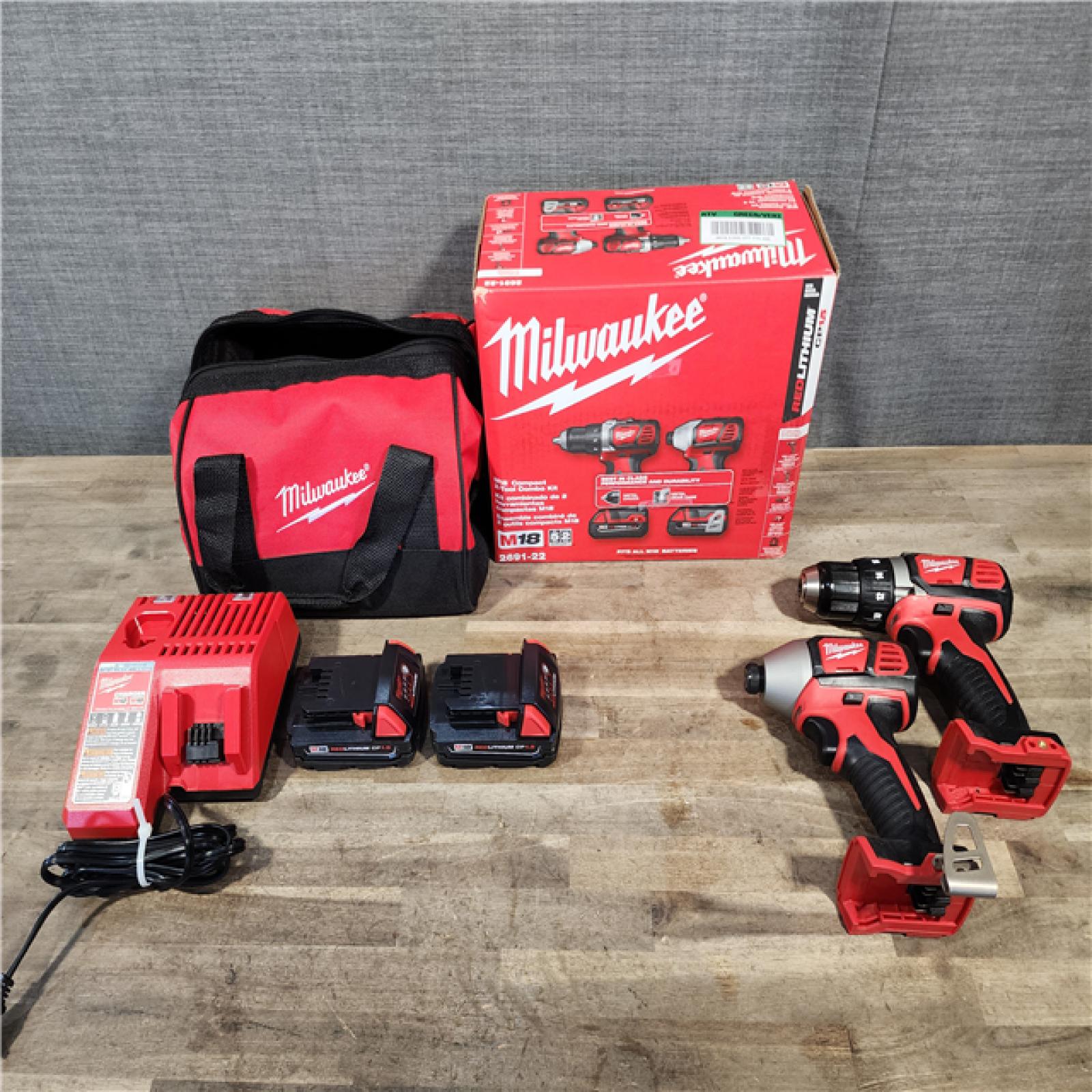 HOUSTON LOCATION - AS-IS Milwaukee 18V Cordless Brushed 2-Tool Drill/Driver and Impact Driver Kit