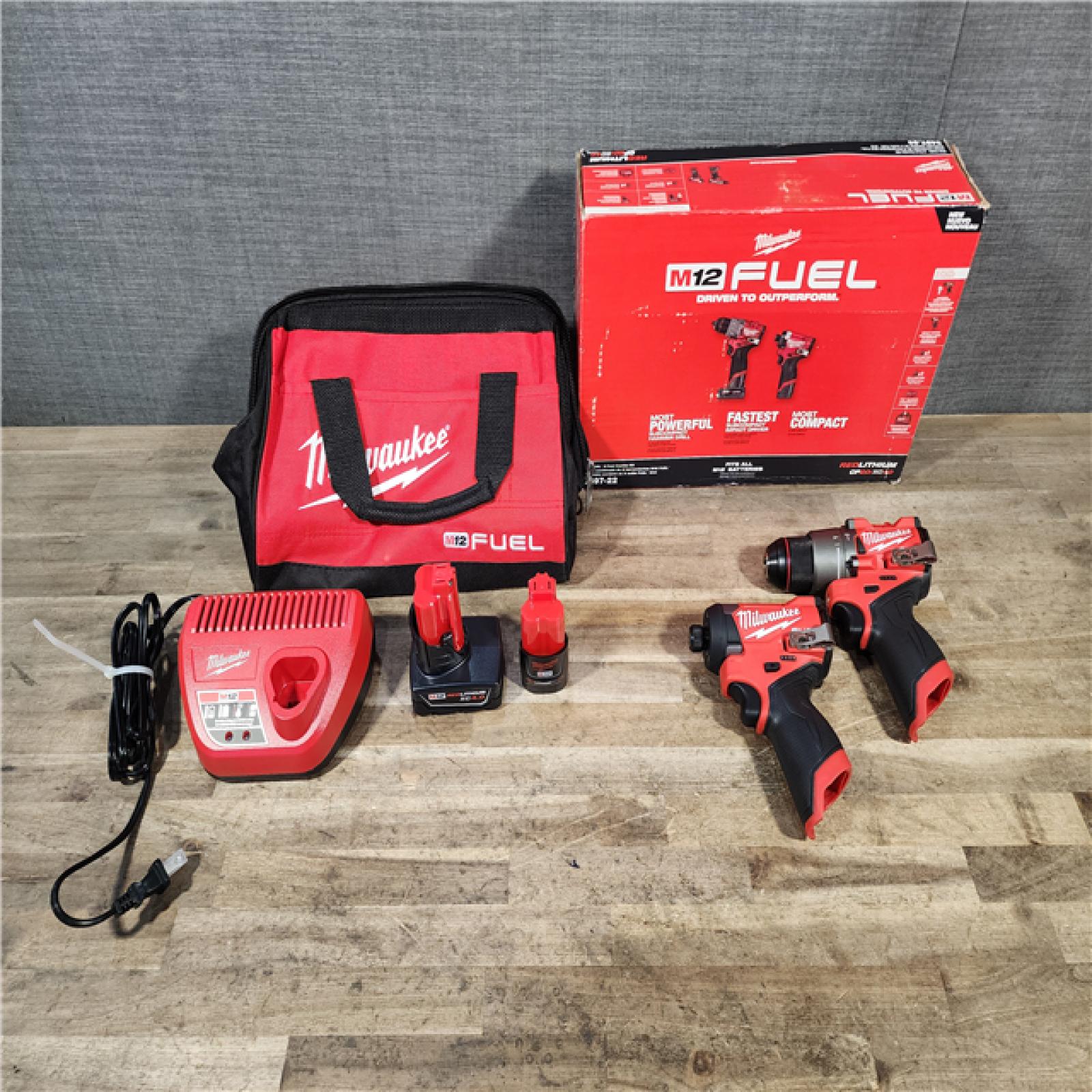 HOUSTON LOCATION - AS-IS Milwaukee FUEL 12-Volt Lithium-Ion Brushless Cordless Hammer Drill and Impact Driver Combo Kit