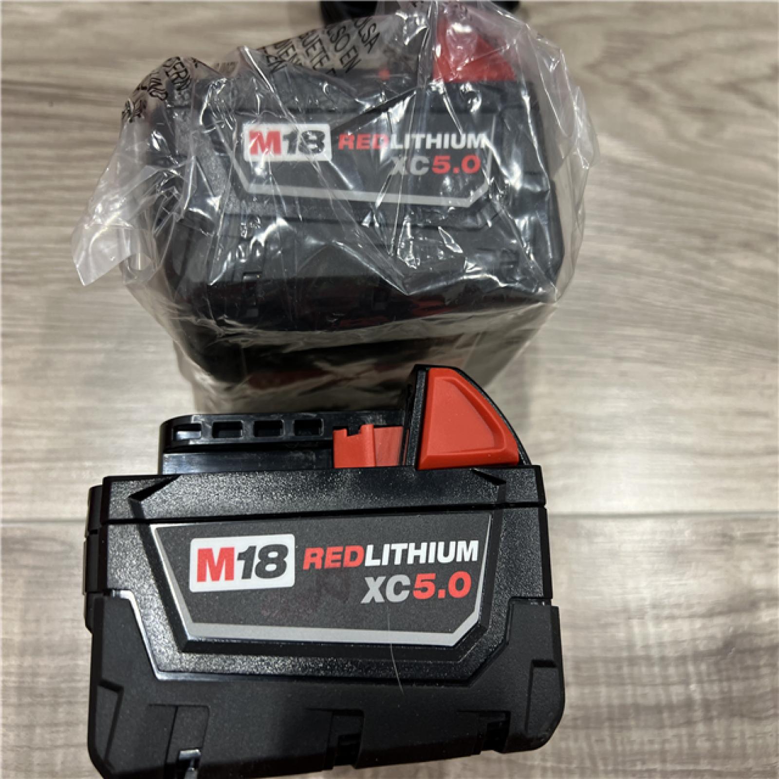 AS-IS Milwaukee M18 REDLITHIUM XC5.0 Battery Starter Kit â€“ (2) 5.0Ah Batteries & M18/M12 Charger  2.5X Runtime  REDLINK Intelligence  Cold Weather Perform