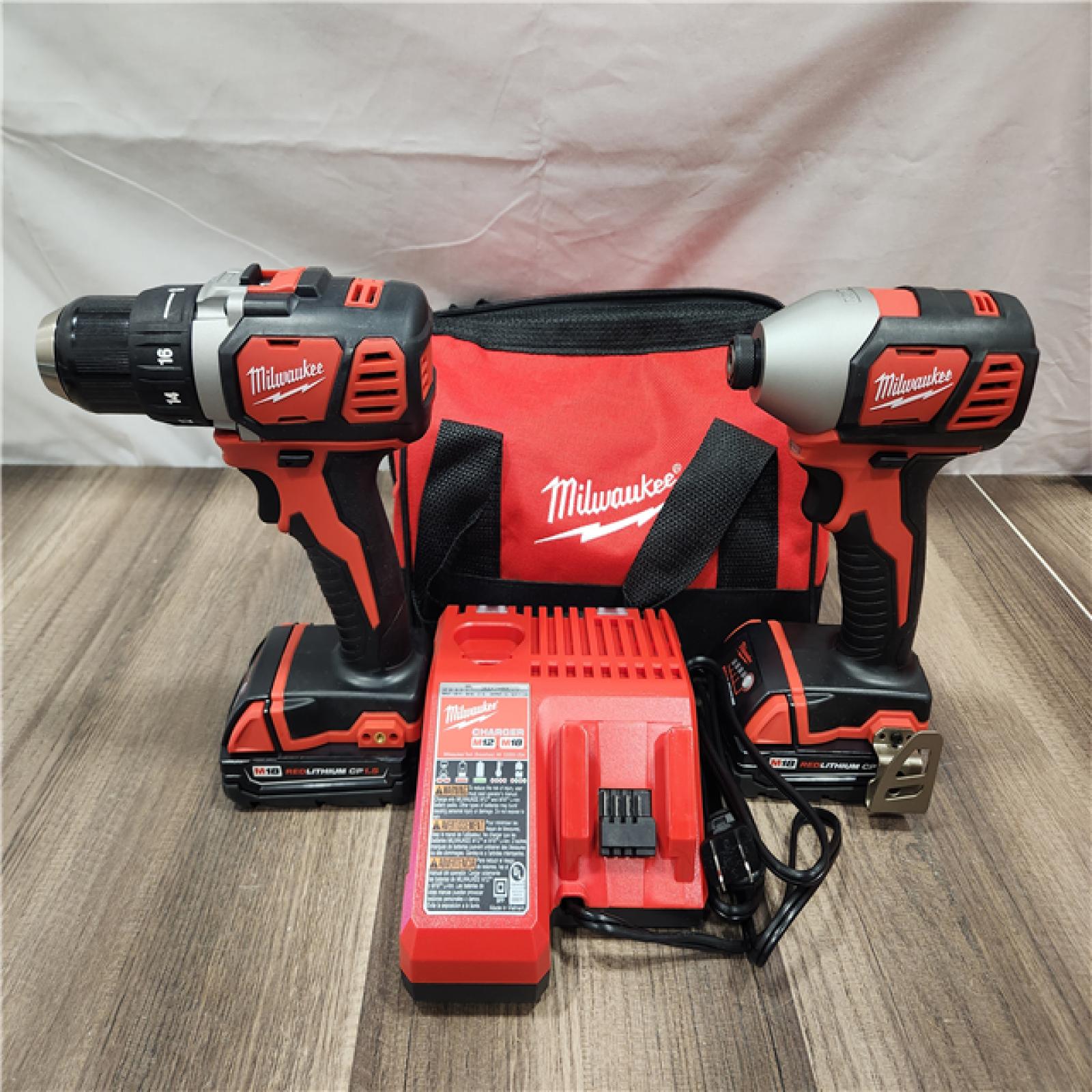 AS-IS- Milwaukee 18V Cordless Brushed 2-Tool Drill/Driver and Impact Driver Kit