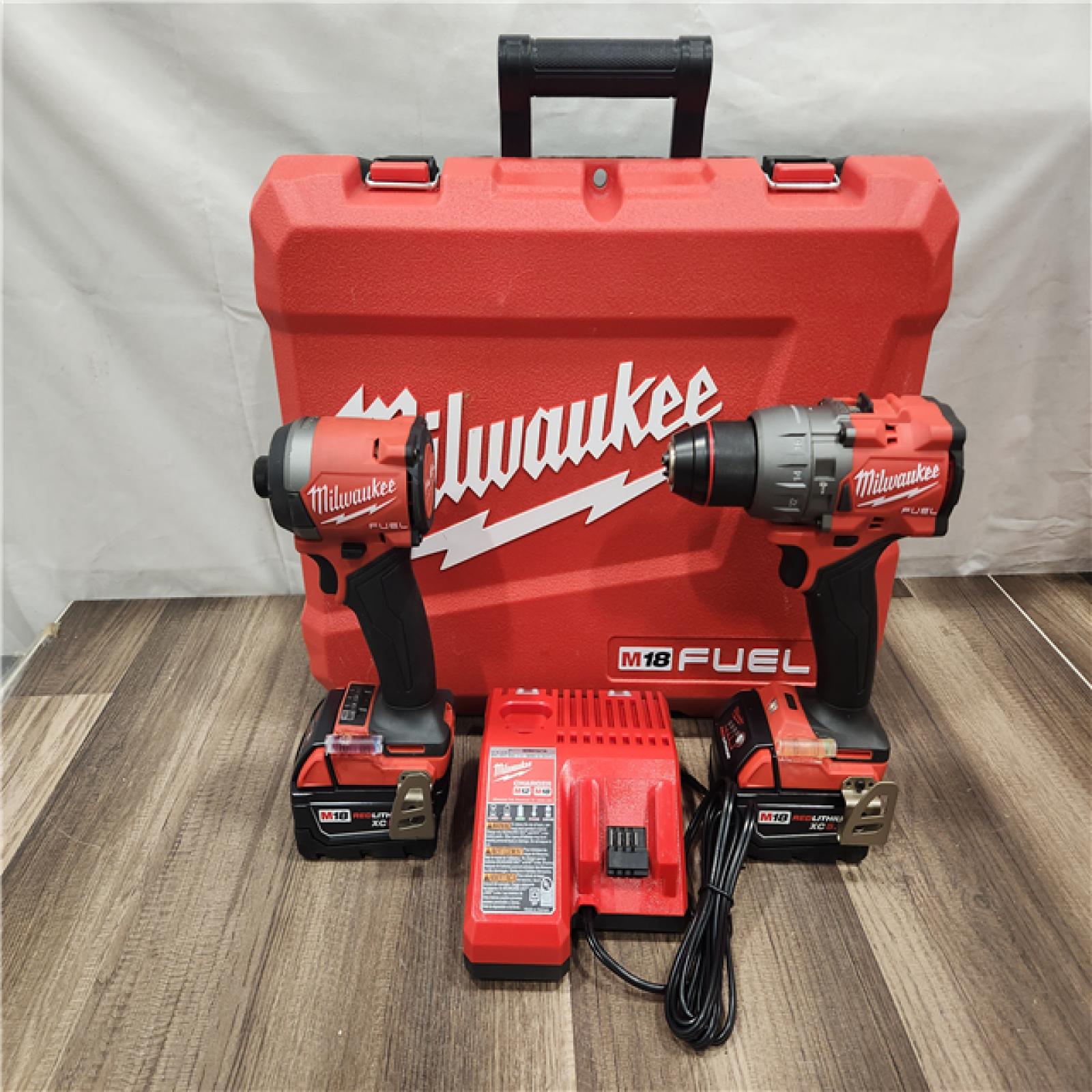 AS-IS- MILWAUKEE FUEL 18V Lithium-Ion Brushless Cordless Hammer Drill and Impact Driver Combo Kit