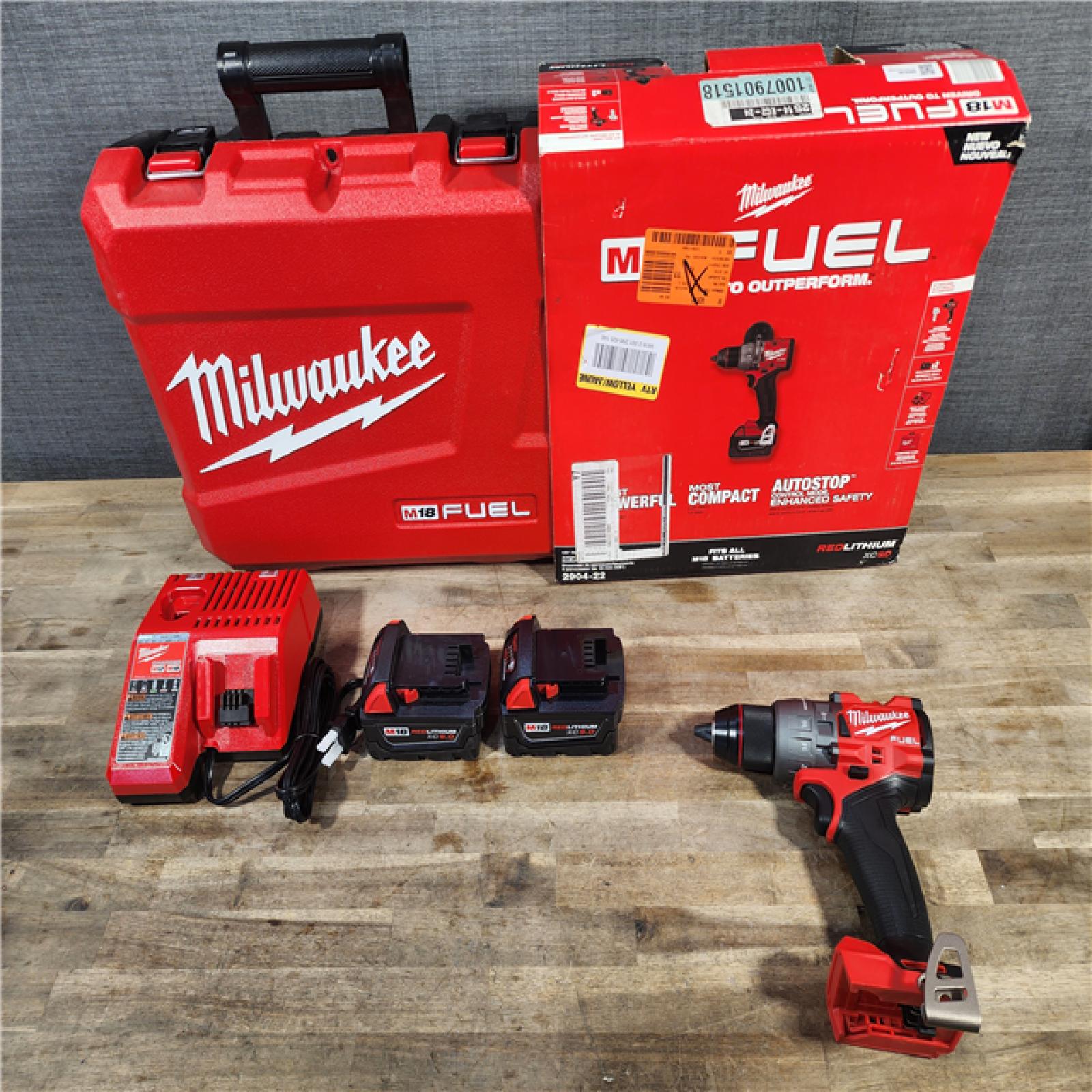 HOUSTON LOCATION - AS-IS (APPEARS LIKE NEW) Milwaukee 2904-22 Hammer Drill Driver Kit with Batteries  Charger & Tool Case  Red