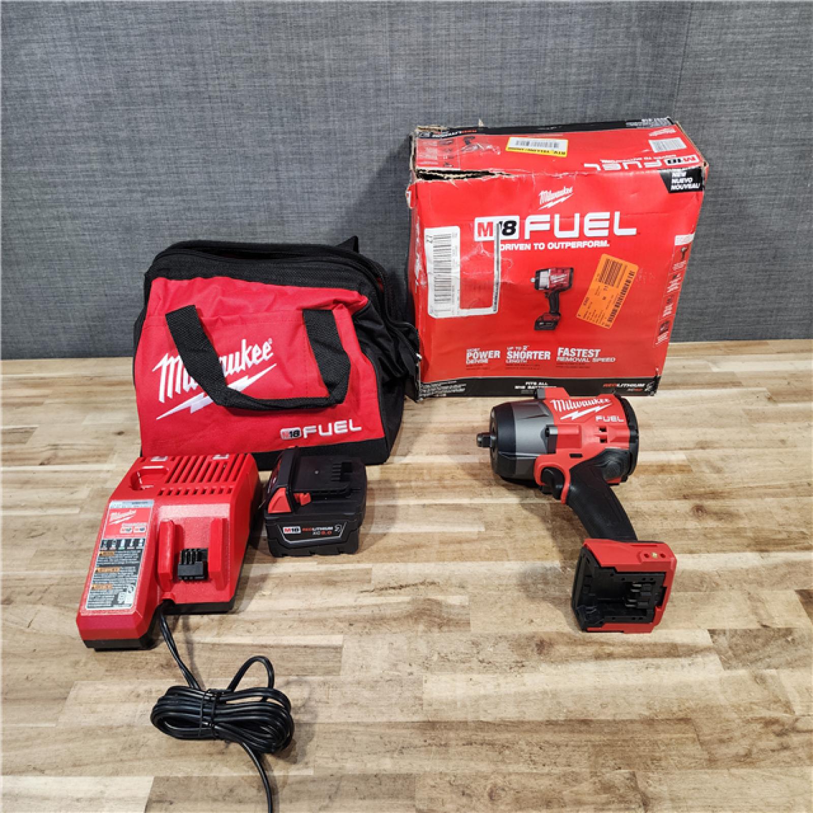 HOUSTON LOCATION - AS-IS (APPEARS LIKE NEW) Milwaukee FUEL 18V Lithium-Ion Brushless Cordless 1/2 in. Impact Wrench w/Friction Ring Kit