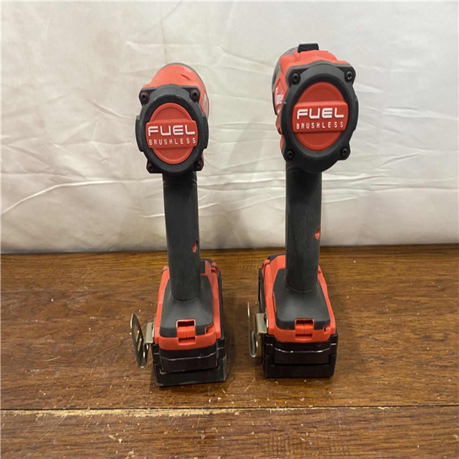 AS-IS MILWAUKEE M18 FUEL 18V Lithium-Ion Brushless Cordless Hammer Drill and Impact Driver Combo Kit (2-Tool) with 2 Batteries