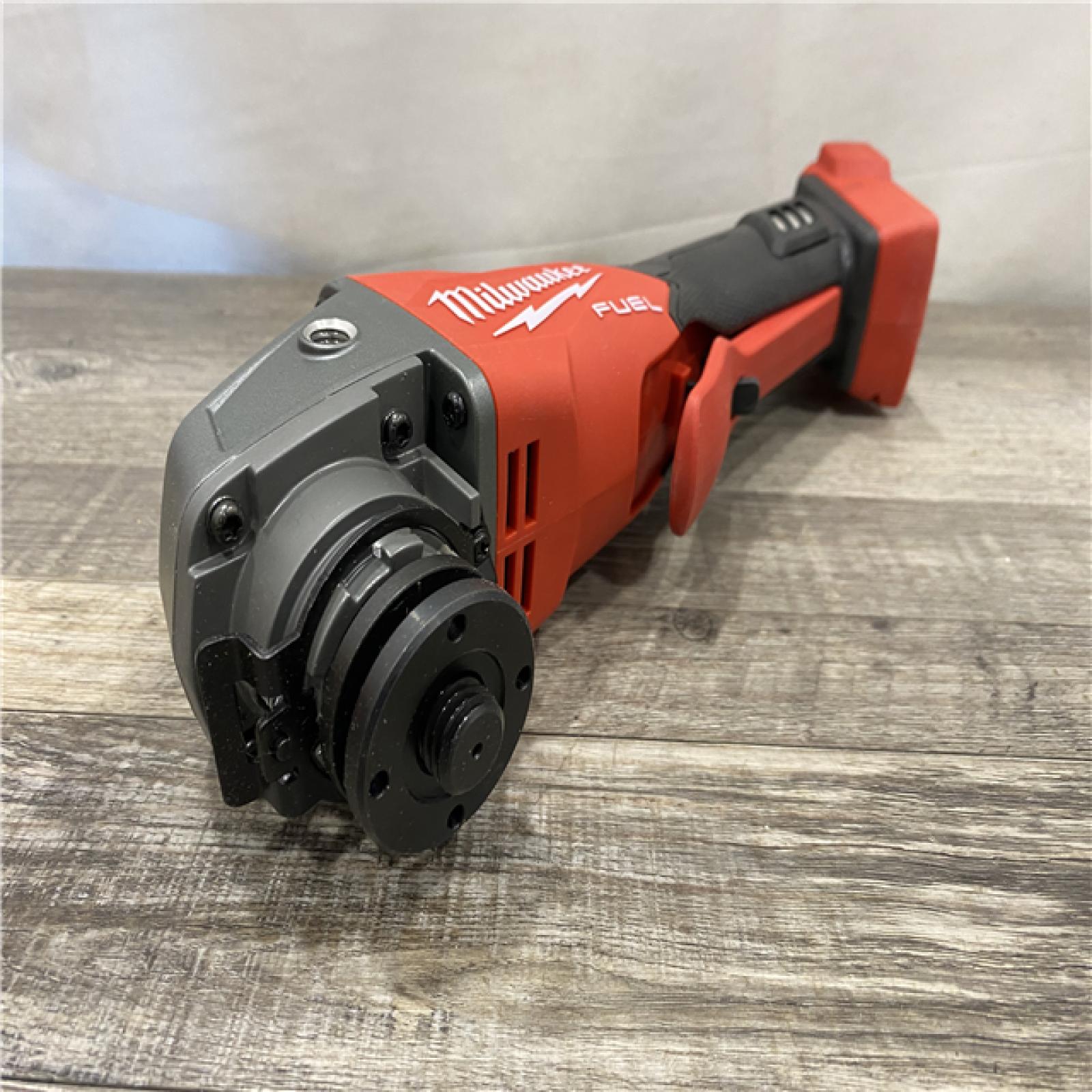 AS-IS Milwaukee FUEL 18V Lithium-Ion Brushless Cordless 4-1/2 in./5 in. Grinder with Variable Speed & Paddle Switch (Tool-Only)