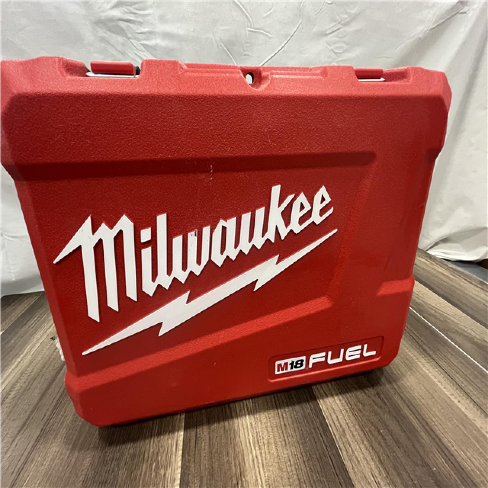 AS-IS MILWAUKEE FUEL 18V Lithium-Ion Brushless Cordless Hammer Drill and Impact Driver Combo Kit (2-Tool) with 2 Batteries