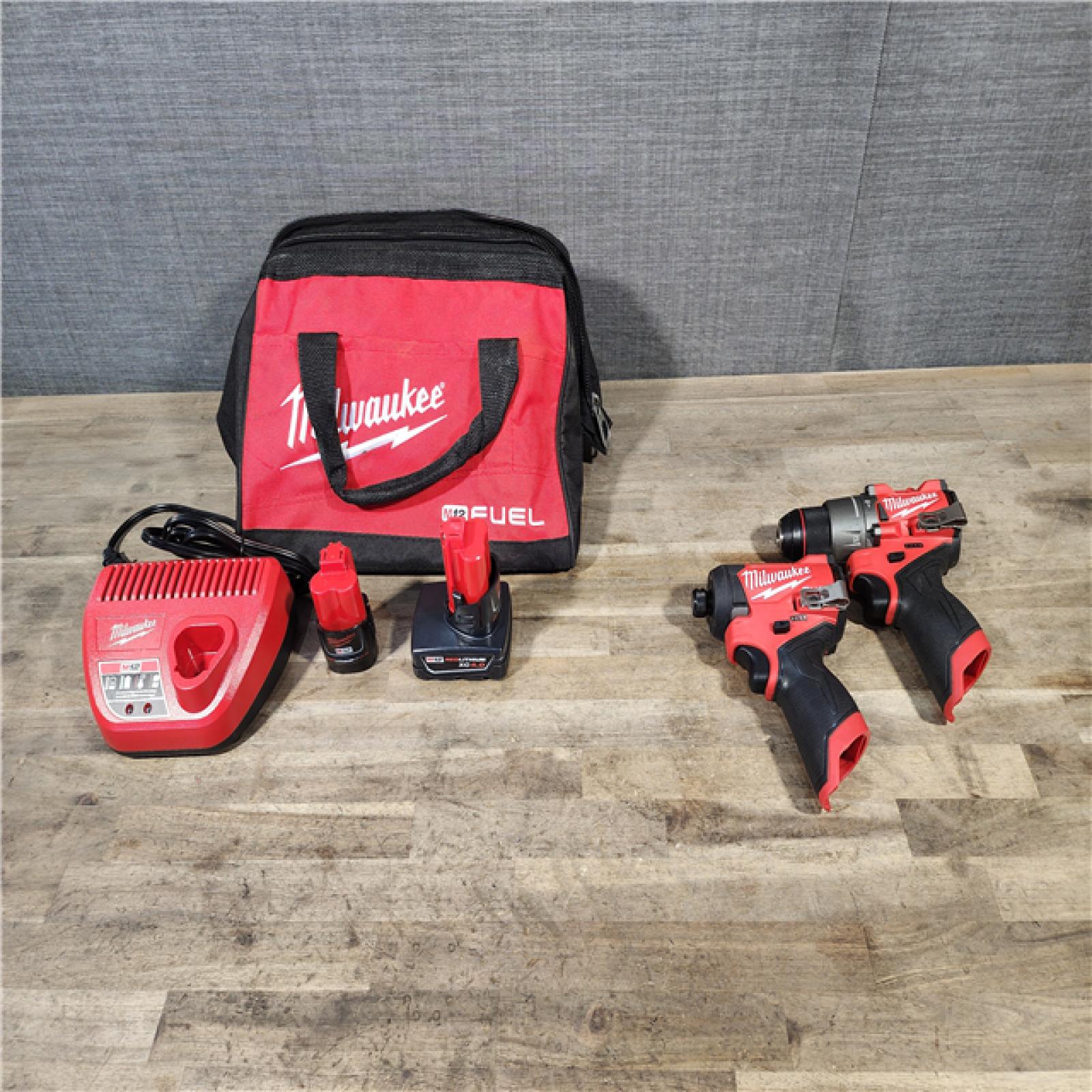 HOUSTON LOCATION - AS-IS Milwaukee FUEL 12-Volt Lithium-Ion Brushless Cordless Hammer Drill and Impact Driver Combo Kit