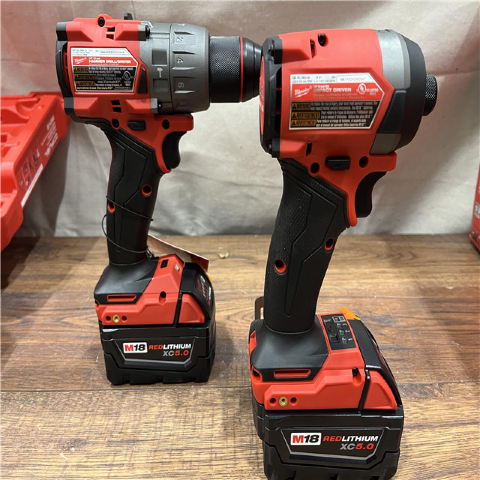 AS-IS Milwaukee M18 FUEL 18V Lithium-Ion Brushless Cordless Hammer Drill and Impact Driver Combo Kit (2-Tool) with 2 Batteries