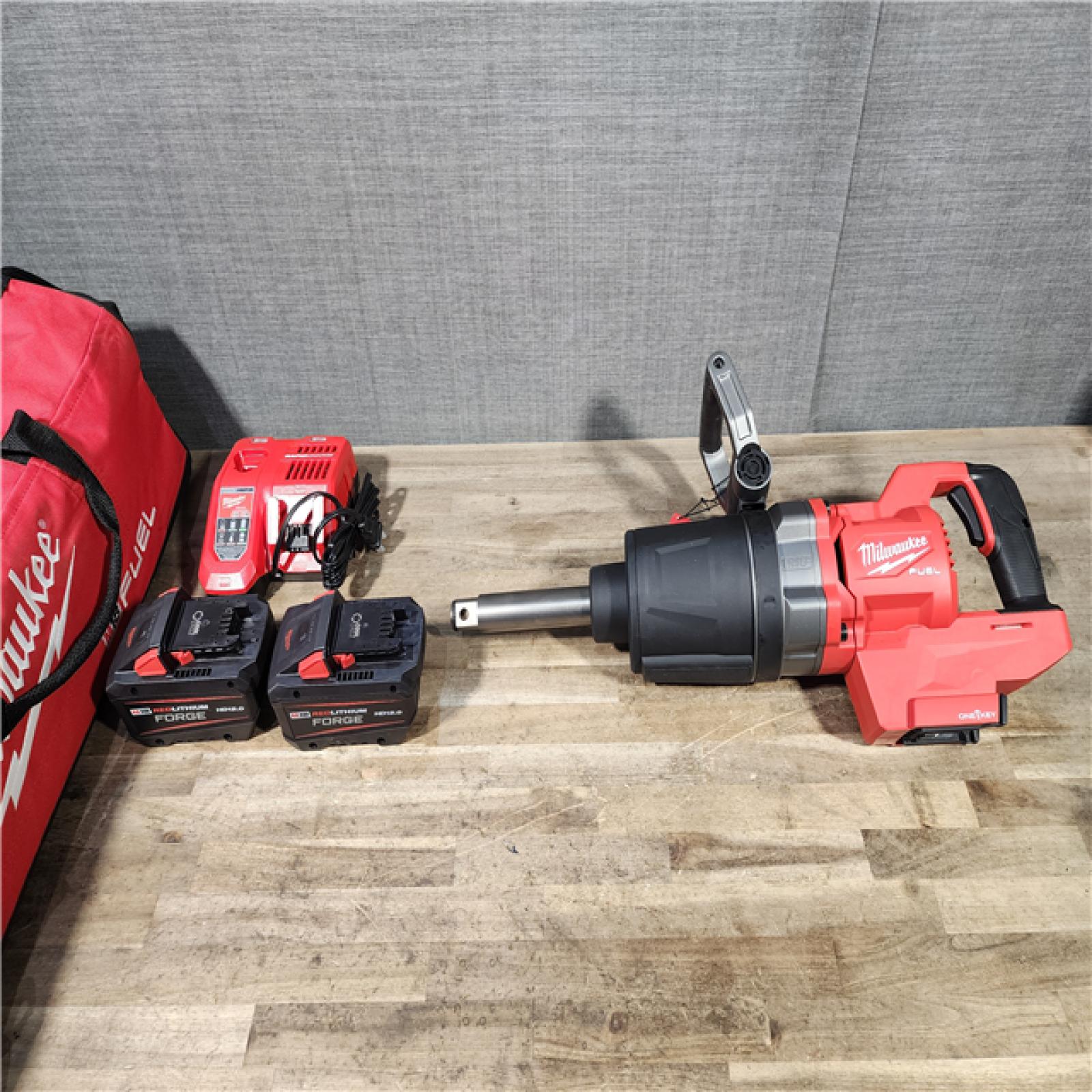 HOUSTON LOCATION - AS-IS (APPEARS LIKE NEW) M18 FUEL 18V Lithium-Ion Brushless Cordless 1 in. Impact Wrench Extended Reach D-Handle Kit W/Two 12.0 Ah Batteries