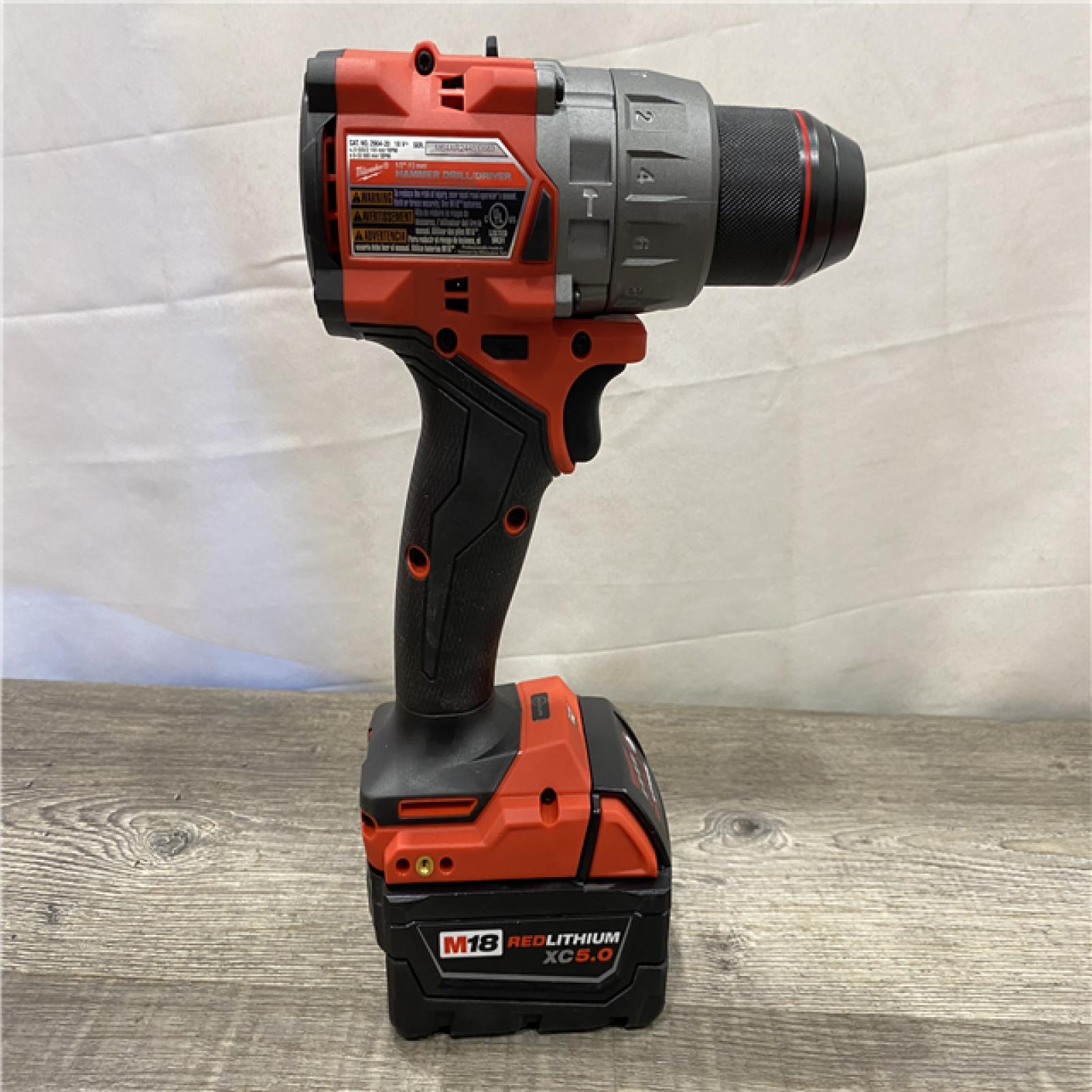 AS-IS Milwaukee FUEL 18V Lithium-Ion Brushless Cordless 1/2 in. Hammer Drill Driver Kit