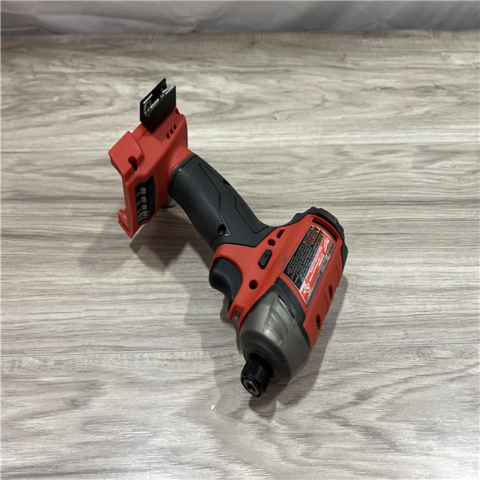 AS-IS Milwaukee M18 FUEL SURGE 18-Volt Lithium-Ion Brushless Cordless 1/4 in. Hex Impact Driver Compact Kit with Two 5.0 Ah Batteries
