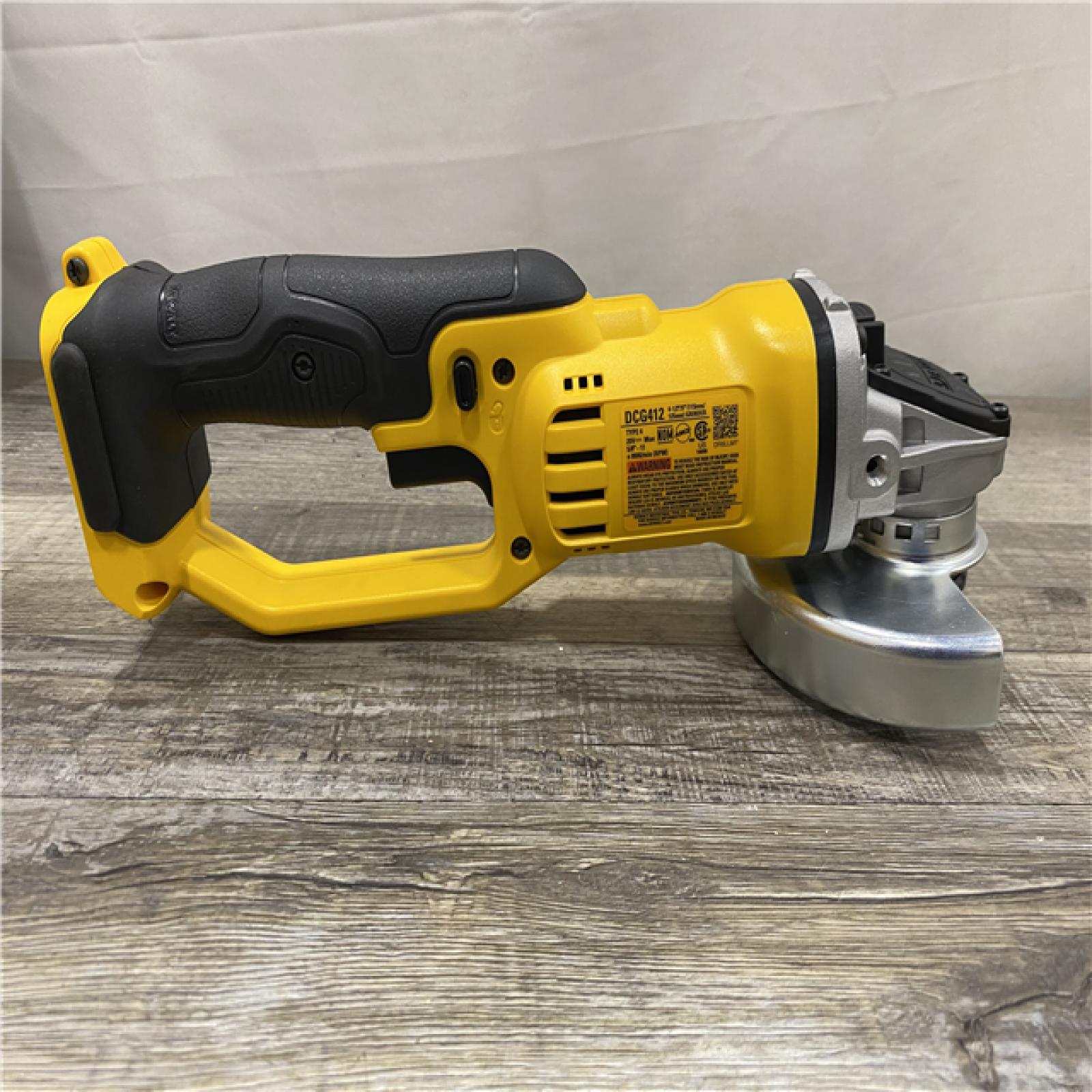 AS-IS DEWALT 20V MAX Cordless 4.5 in. - 5 in. Angle Grinder (Tool Only)