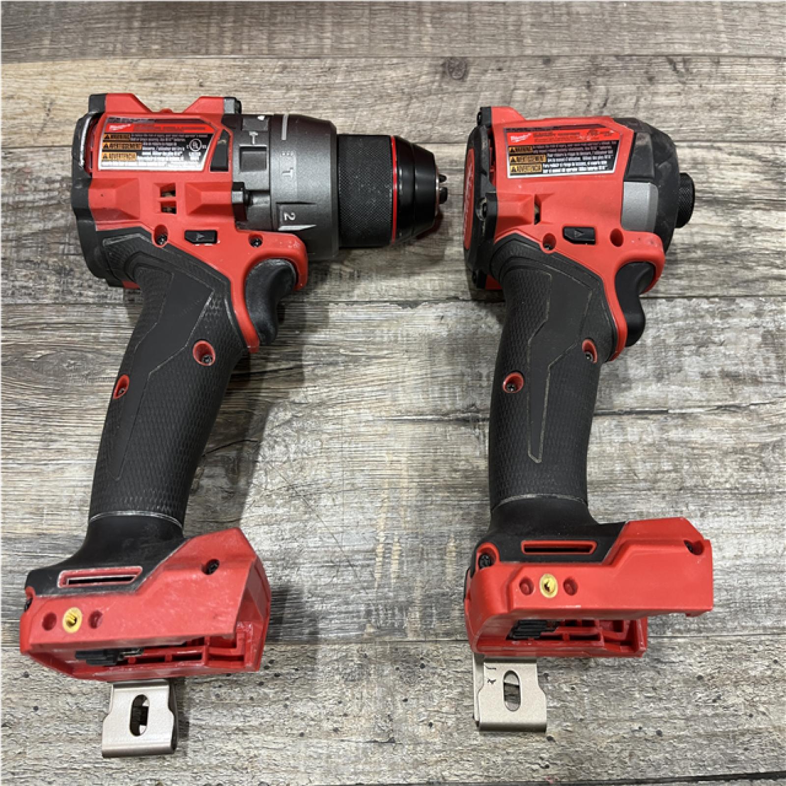 AS-IS Milwaukee FUEL 18V Lithium-Ion Brushless Cordless Hammer Drill and Impact Driver Combo Kit