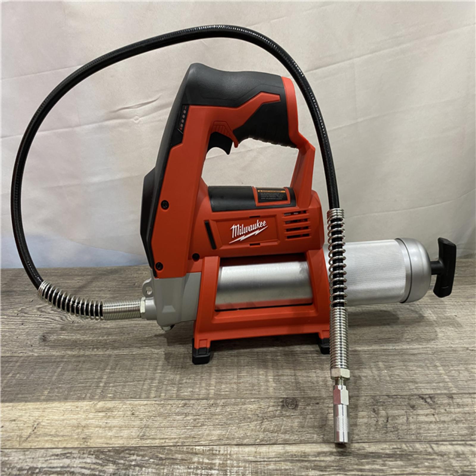 AS-IS Milwaukee 12V Lithium-Ion Cordless Grease Gun (Tool-Only)
