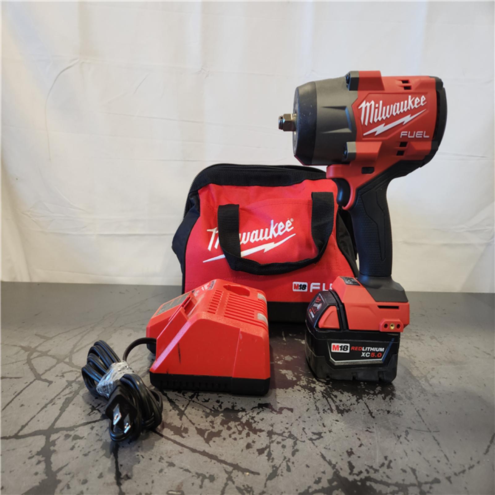 AS-IS- Milwaukee 1/2  Impact Wrench 5Ah Battery  Charger