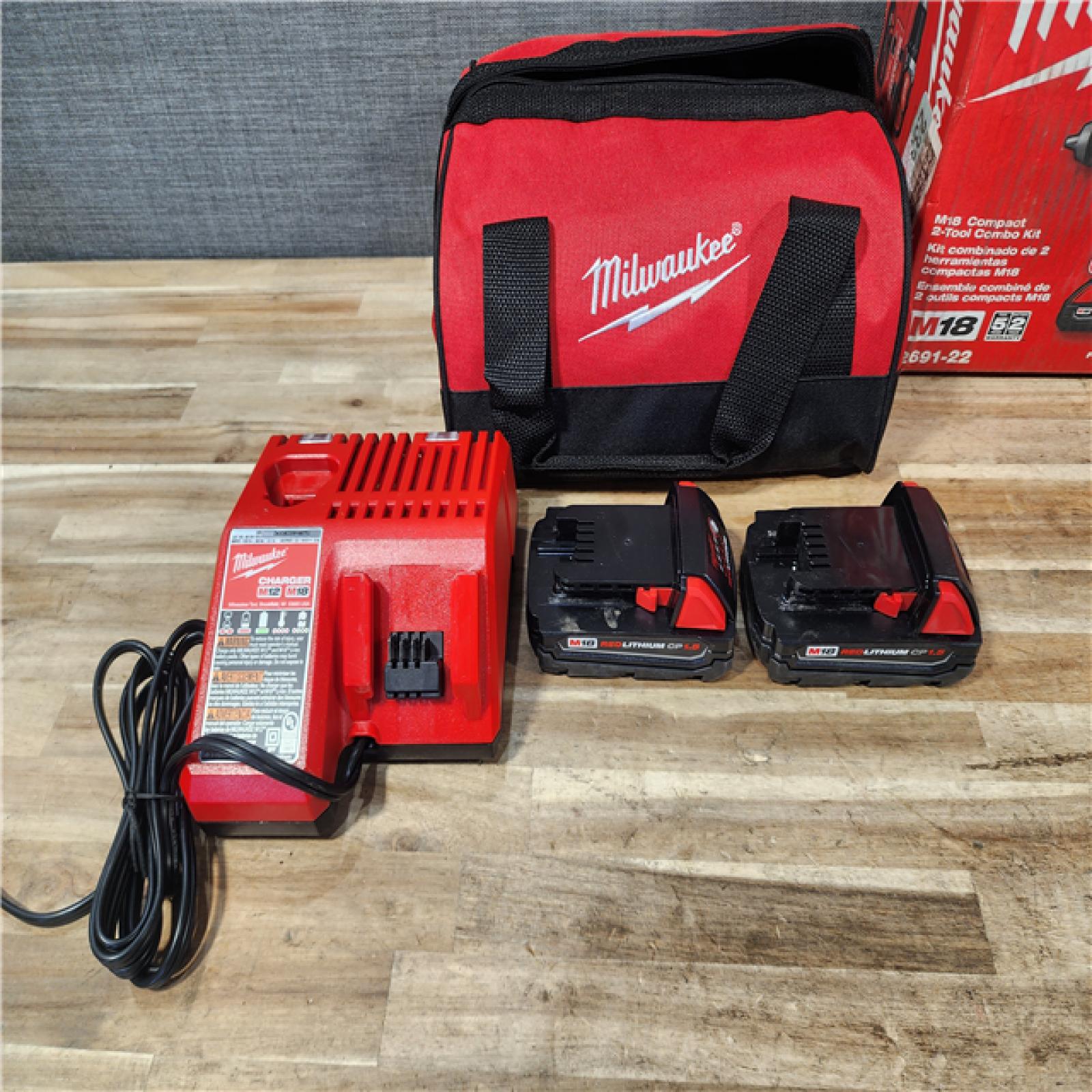 HOUSTON LOCATION - AS-IS Milwaukee 18V Lithium-Ion Cordless Drill Driver/Impact Driver Combo Kit