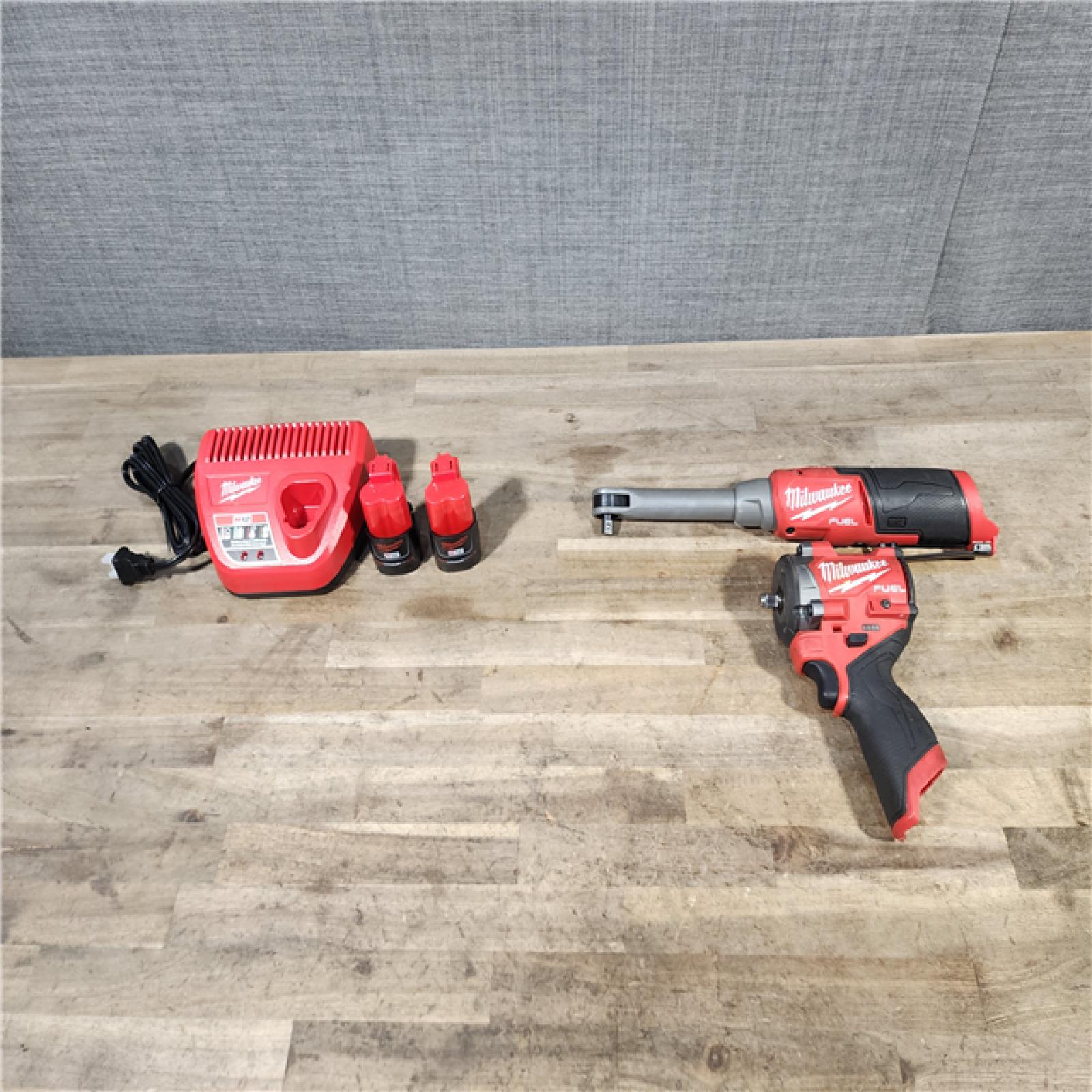 HOUSTON LOCATION - AS-IS MILWAUKEE 2 TOOL COMBO KIT W/ (2) BATTERY & CHARGER