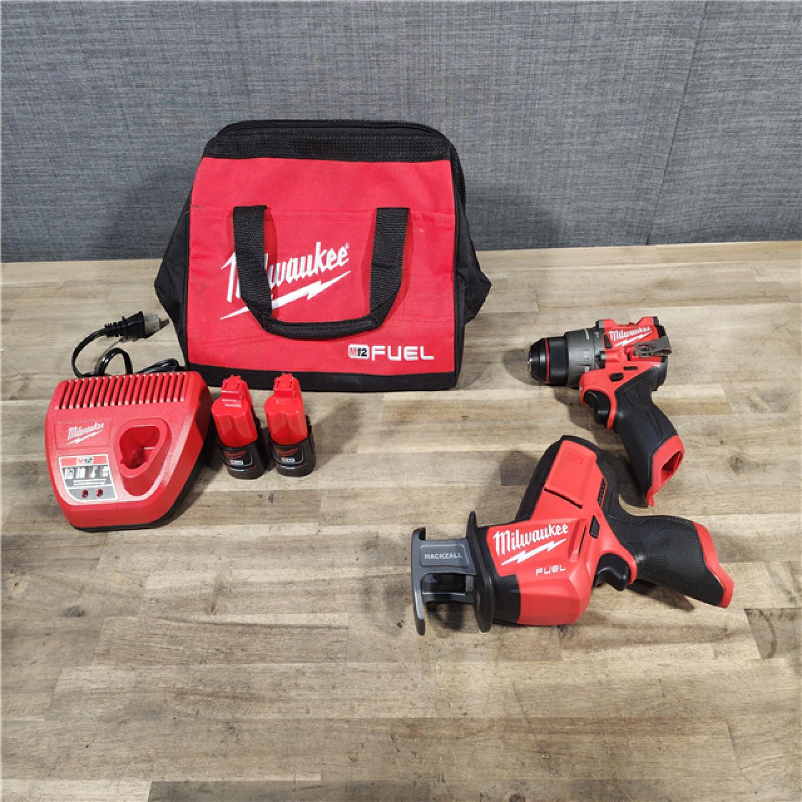 HOUSTON LOCATION - AS-IS (APPEARS LIKE NEW) MILWAUKEE 2 TOOL COMBO KIT W/ (2) BATTERY & CHARGER