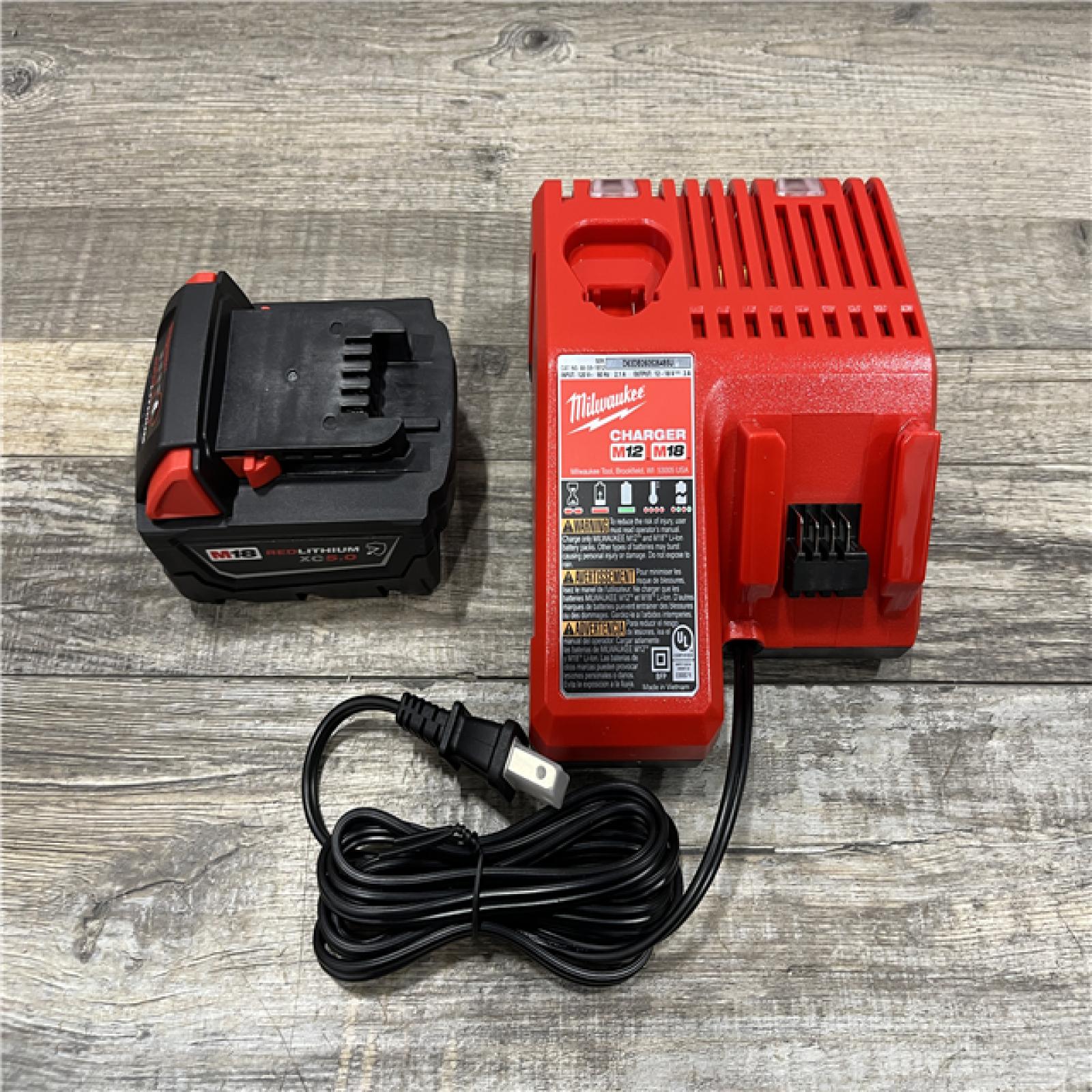 AS-IS Milwaukee 18-Volt Lithium-Ion XC Starter Kit with One 5.0Ah Battery and Charger