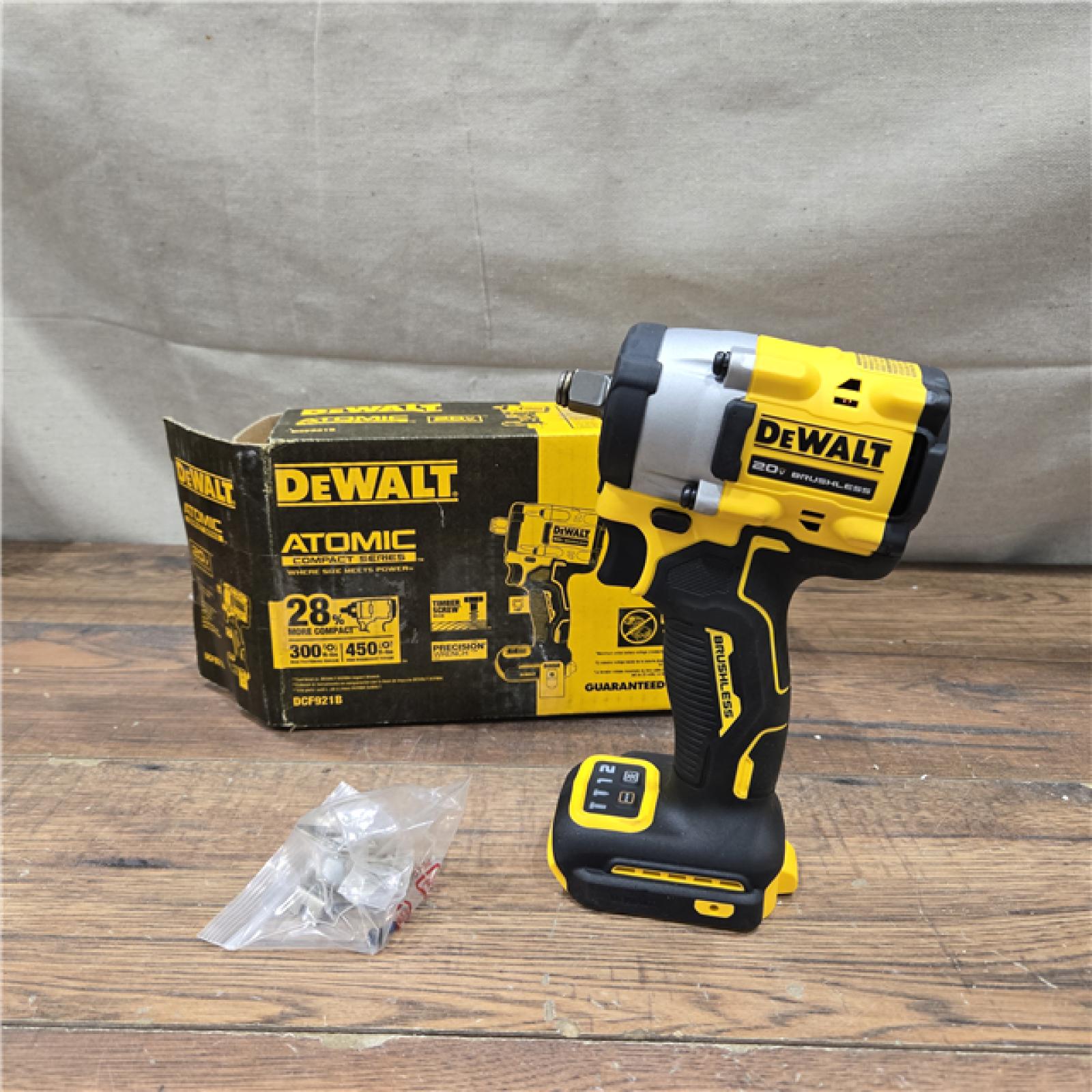 AS-IS DeWalt 20V MAX ATOMIC 1/2 in. Cordless Brushless Compact Impact Wrench Tool Only