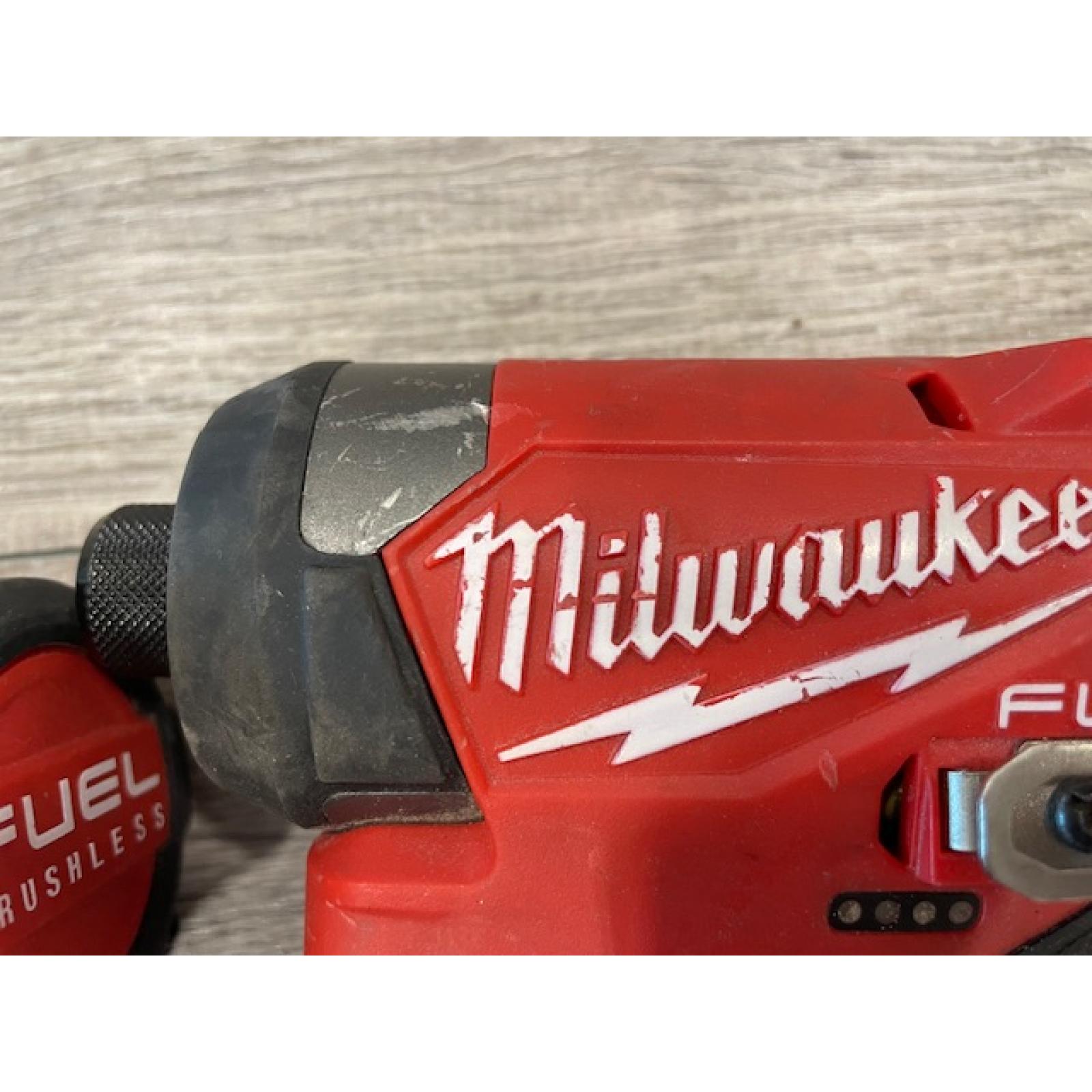 AS-IS Milwaukee FUEL 12-Volt Lithium-Ion Brushless Cordless Hammer Drill and Impact Driver Combo Kit