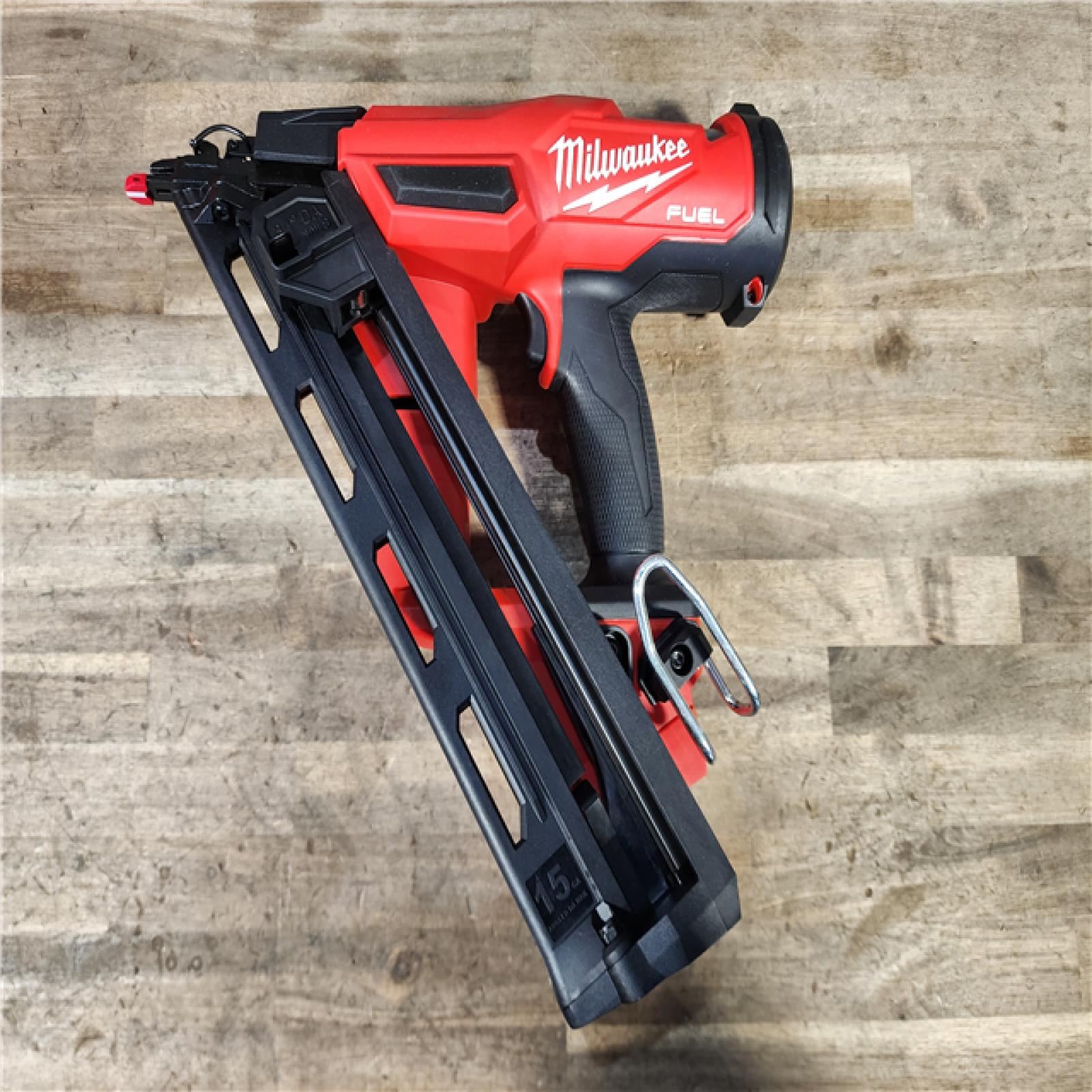HOUSTON LOCATION - AS-IS (APPEARS LIKE NEW) Milwaukee 2839-20 M18 FUEL 15 Ga. 18 Volt Brushless Angled Finish Nailer (TOOL ONLY)