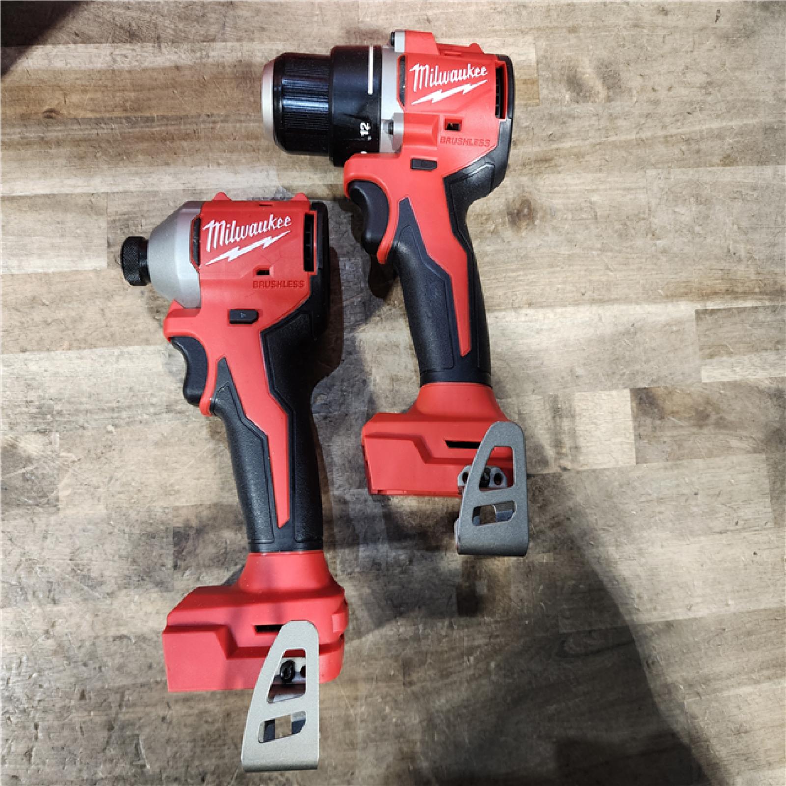 HOUSTON LOCATION - AS-IS Milwaukee M18 18V Lithium-Ion Brushless Cordless Compact Drill/Impact Combo Kit (2-Tool) W/(2) 2.0 Ah Batteries  Charger & Bag