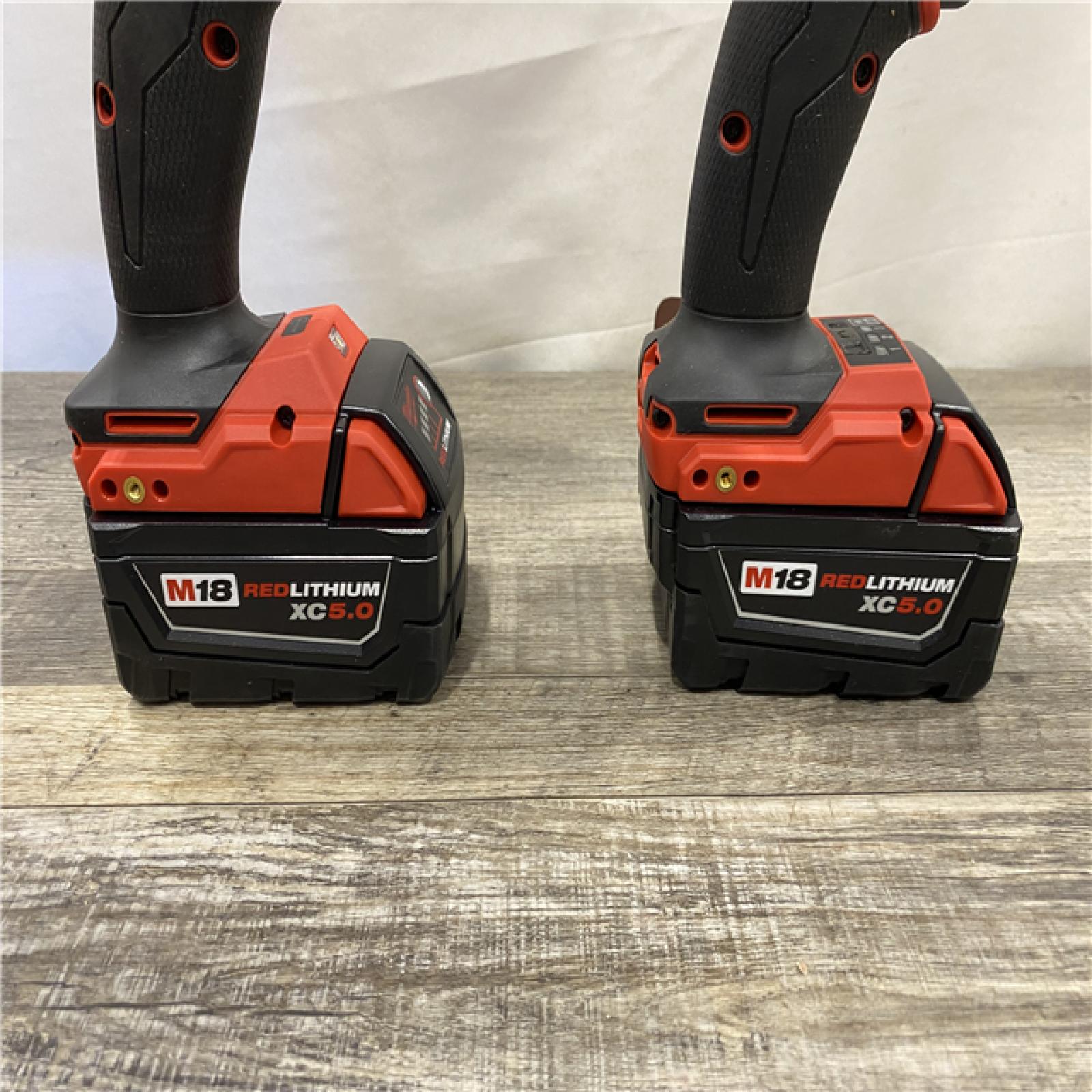 AS-IS Milwaukee FUEL 18V Lithium-Ion Brushless Cordless Hammer Drill and Impact Driver Combo Kit