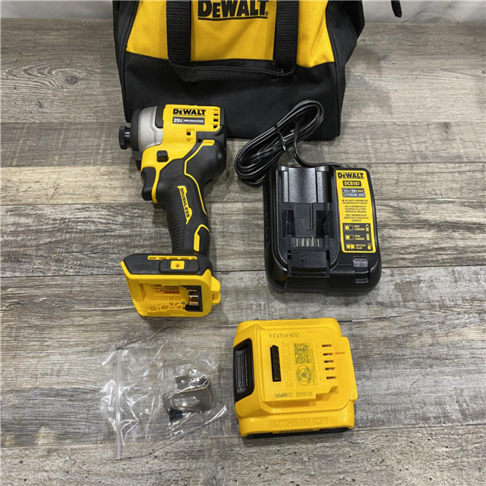 AS-IS DEWALT Atomic 20V Max Lithium-Ion Brushless Cordless Compact 1/4 in. Impact Driver Kit