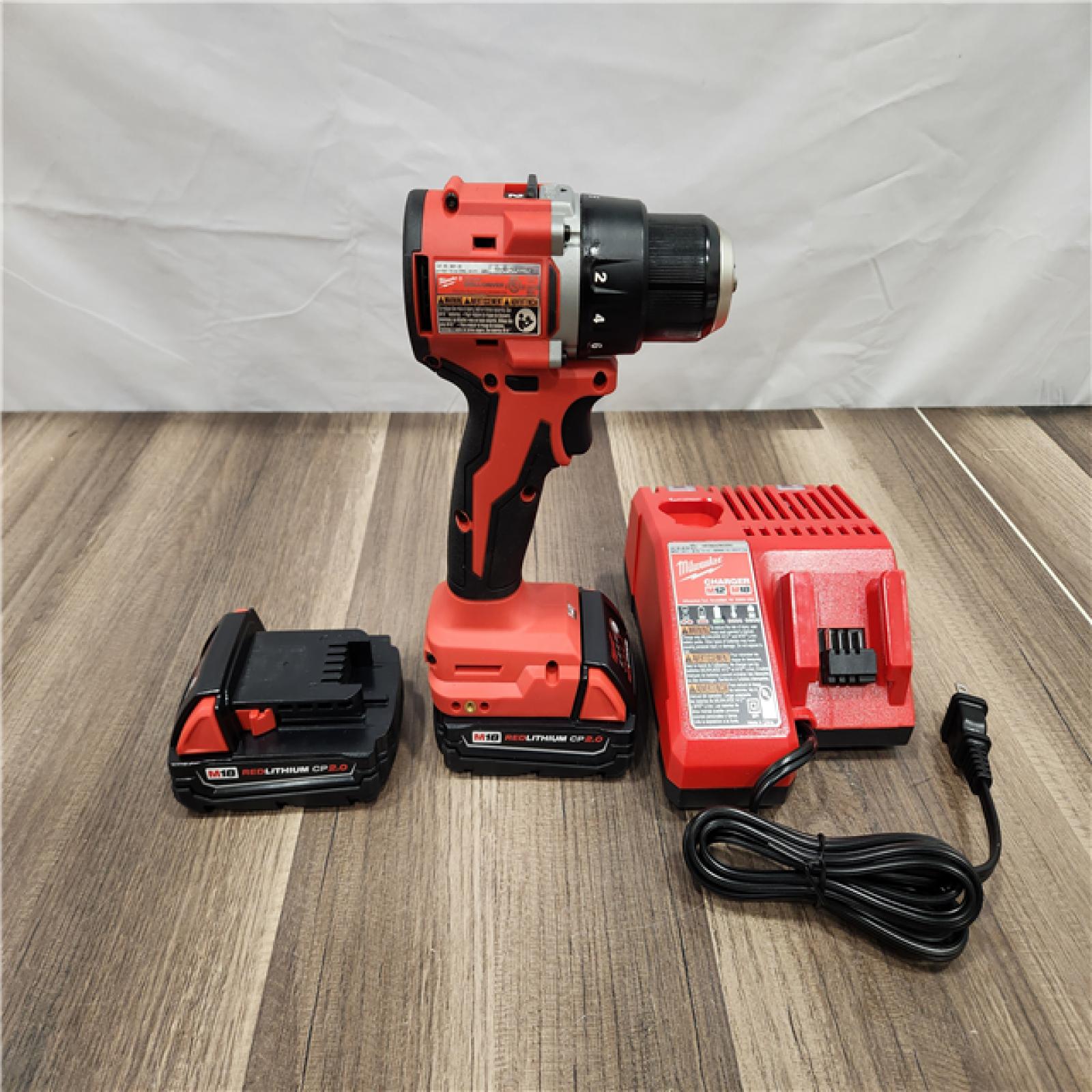 AS-IS -  Milwaukee M18 18V Lithium-Ion Brushless Cordless 1/2 in. Compact Drill/Driver Kit with Two 2.0 Ah Batteries, Charger and Case