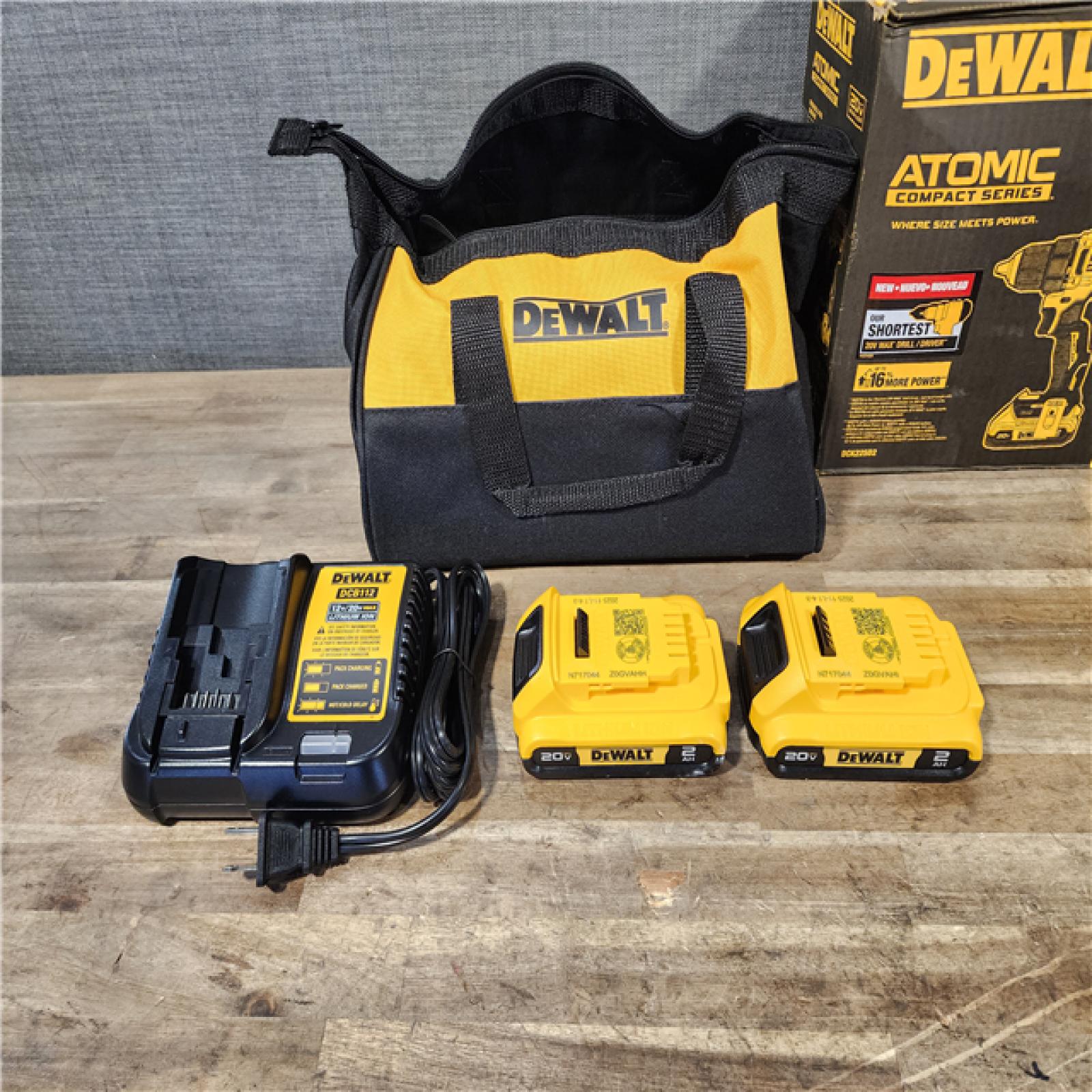 HOUSTON LOCATION - AS-IS (APPEARS LIKE NEW) Dewalt DCK225D2 20V MAX ATOMIC Brushless Compact Lithium-Ion 1/2 in. Cordless Drill Driver and 1/4 in. Impact Driver Combo Kit with 2 Batteries 2 Ah