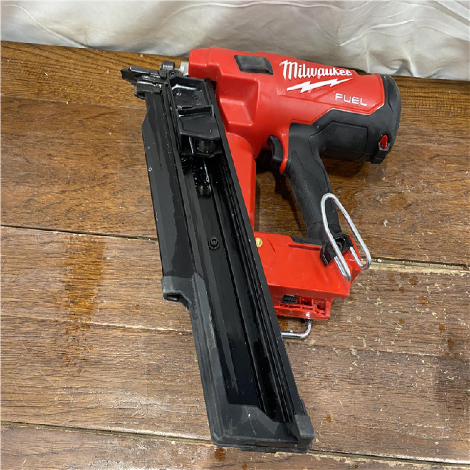 AS-IS Milwaukee 2744-20 M18 FUEL 3-1/2 in. 18-Volt 21-Degree Lithium-Ion Brushless Cordless Framing Nailer (Tool-Only)