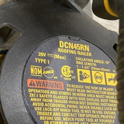 AS-IS DEWALT 20V MAX Lithium-Ion 15-Degree Electric Cordless Roofing Nailer Kit