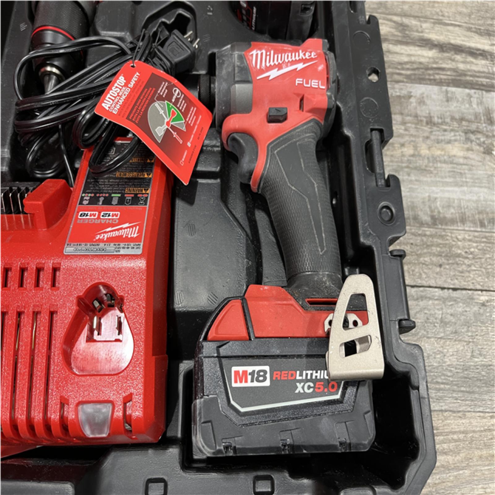 AS-IS Milwaukee FUEL 18V Lithium-Ion Brushless Cordless Hammer Drill and Impact Driver Combo Kit